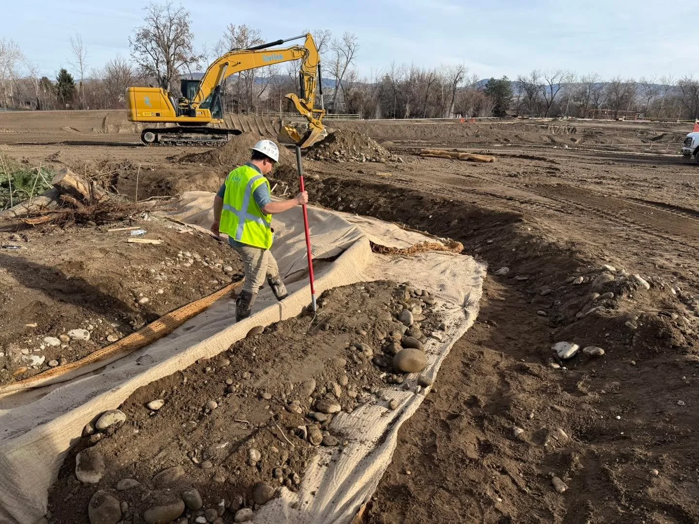 Not only do we design them, we BUILD them! Fabric Encapsulated Soil Lifts (FESLs) are used to protect stream banks. When thoughtfully designed and constructed, FESLs:

&bull; Reduce chronic bank erosion and fine sediment delivery
&bull; Protect water