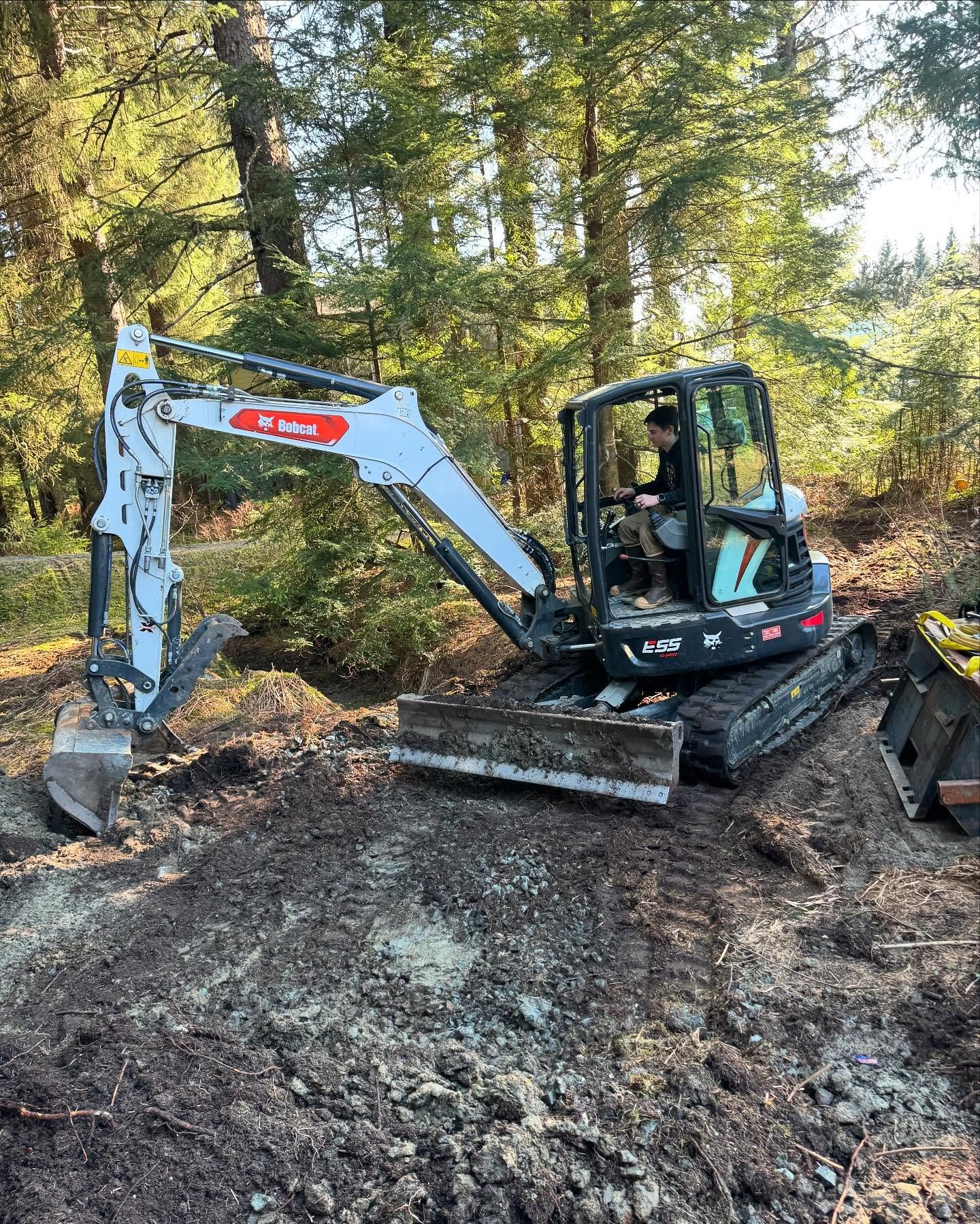 Parking pads aren&rsquo;t just for boats or cars - sometimes they are for skid steer attachments 😎
