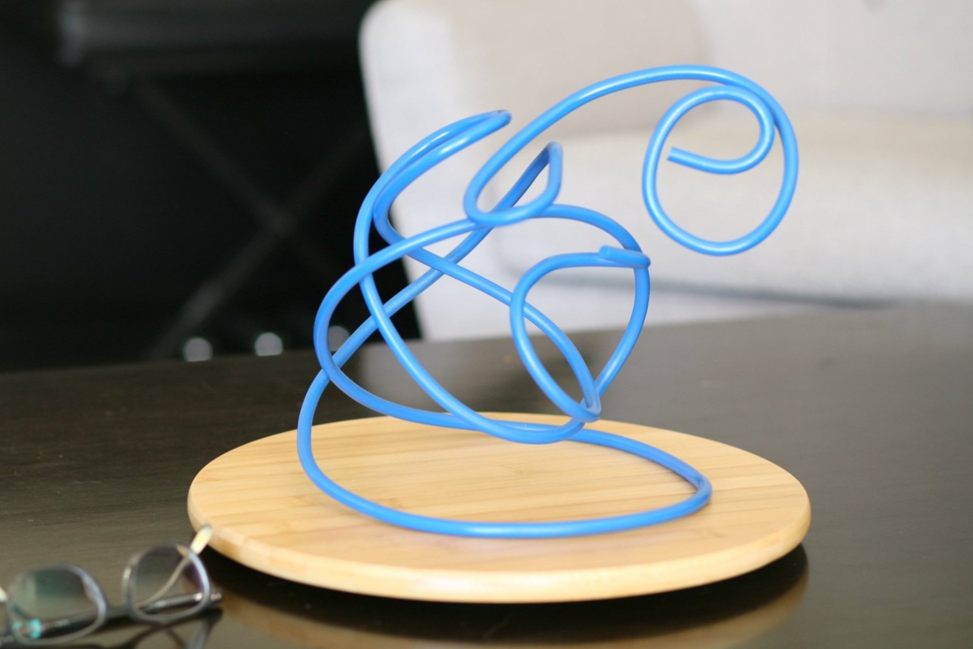 blue steel twisted rod sculpture