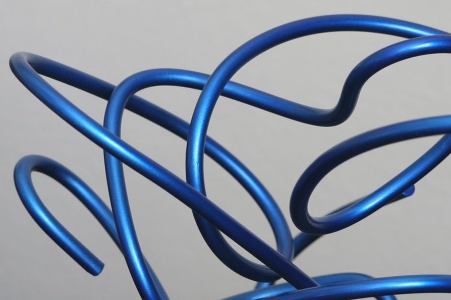 Twisted metal abstract sculpture, metallic blue, detail