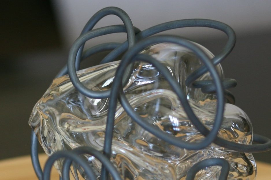 Detail of Steel metal cage and clear glass orb