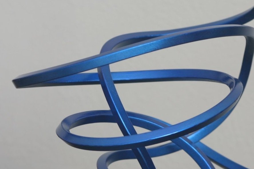 Twisted steel abstract sculpture, blue metallic, detail