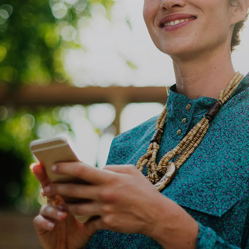 woman holding a phone