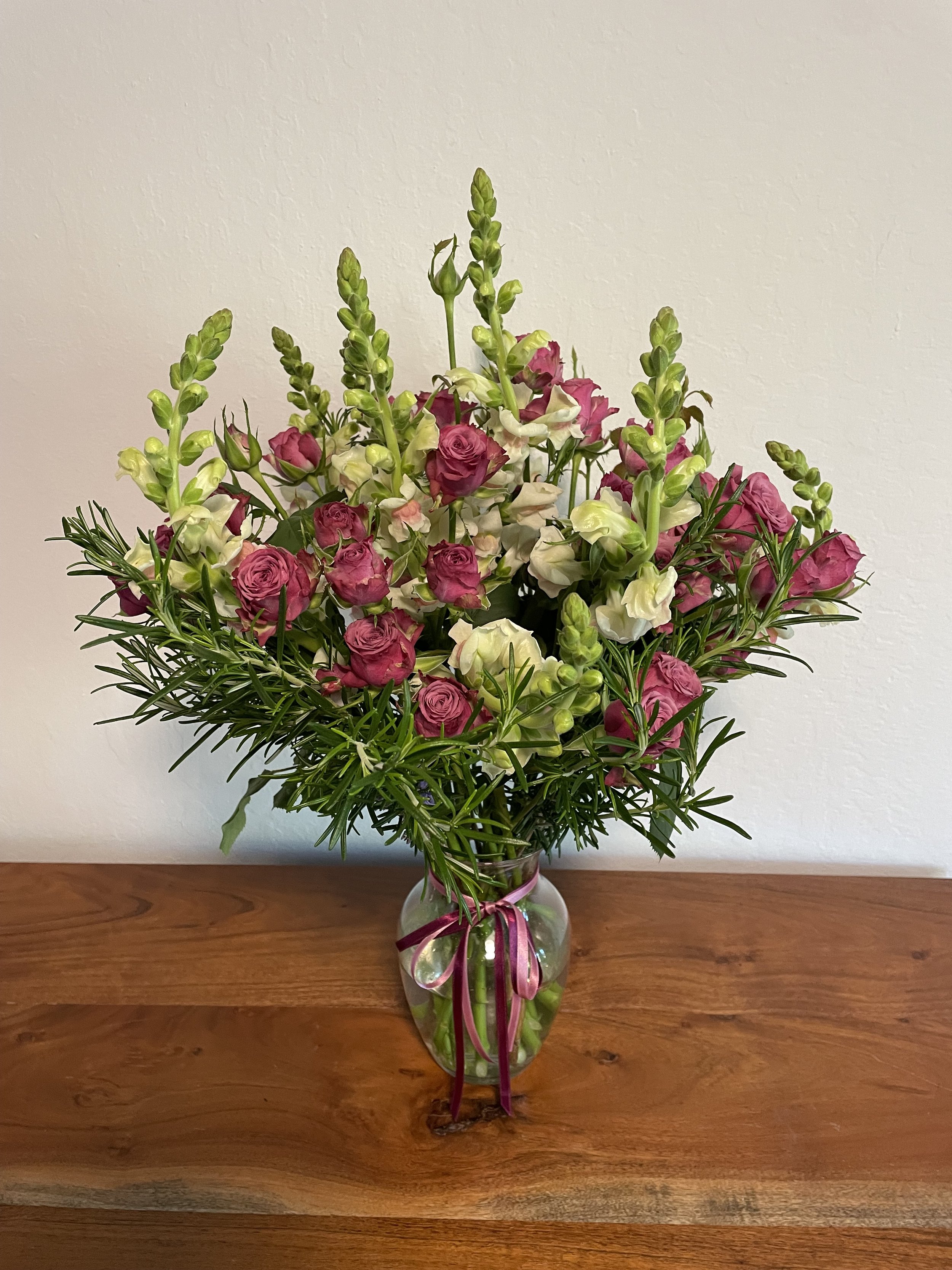 Make a cat safe bouquet with roses snapdragons and rosemary.jpg