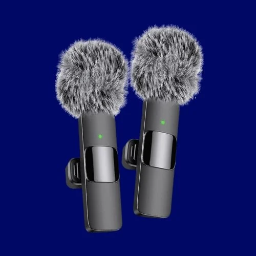Two wireless microphone transmitters against a blue background.