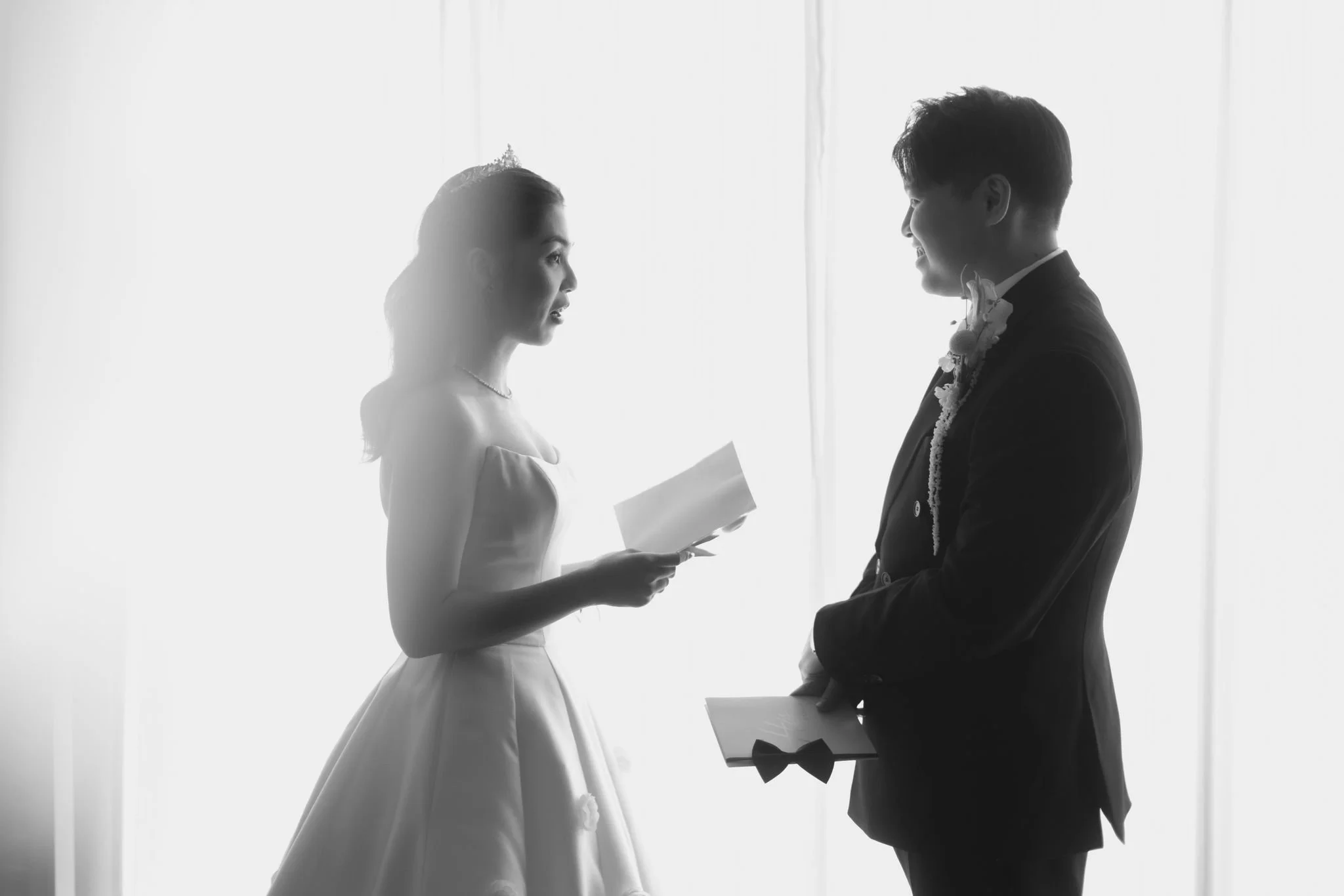 Black and white portrait of Merilynn and Daryl sharing a quiet moment together on their wedding day.