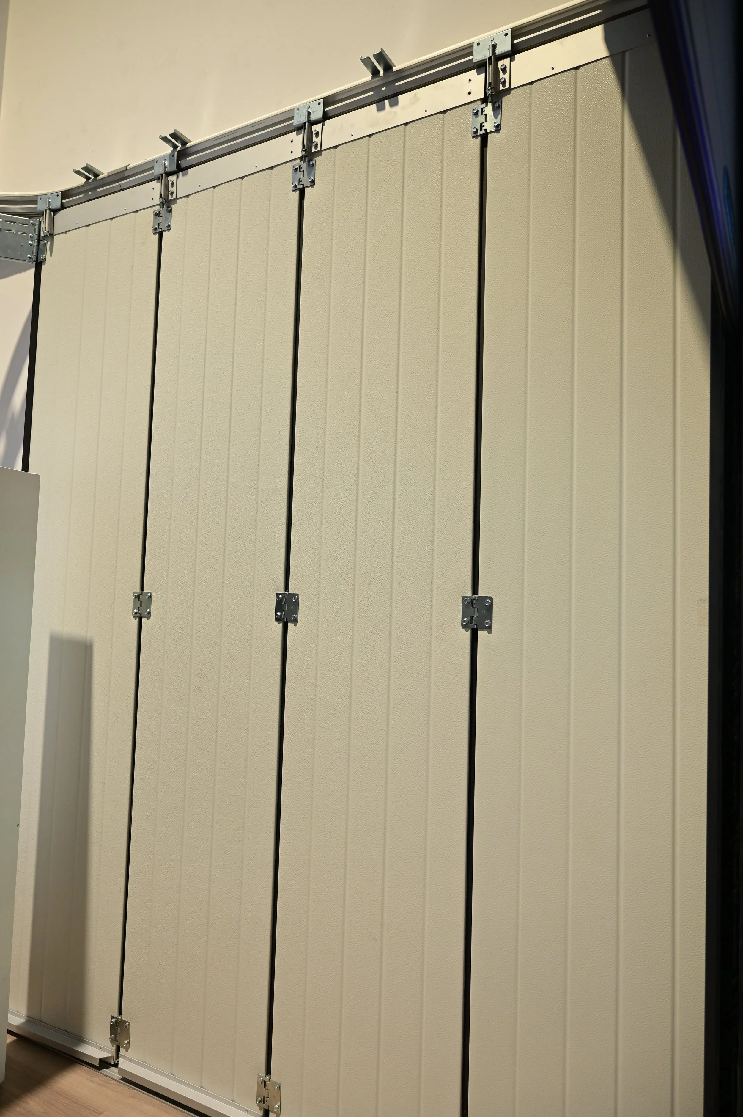 ALMOSALLAMY Side sliding sectional garage doors.JPG