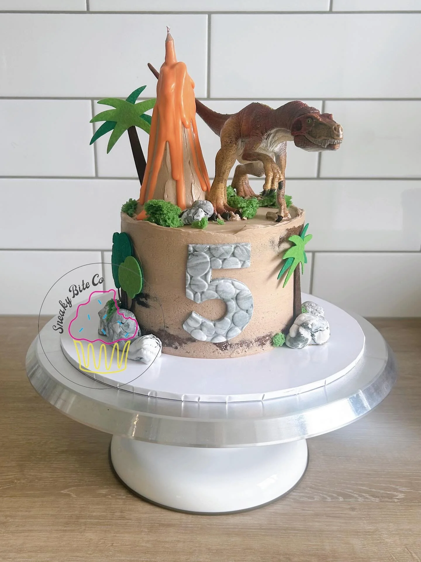 I can hear this dinosaur roar Phoenix! 🦖🌋

A dino &amp; volcano cake for a special 5th birthday. 
I love the choices these kids make each year. So much fun! 🙌🏼

🎂 Chocolate
📌 Dinosaur &amp; trees supplied by client.
.
.
.
.
.
#dinosaurcake #vol