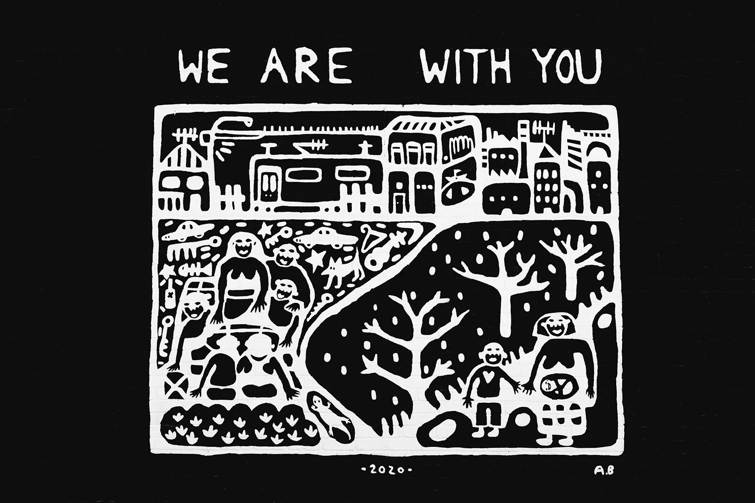 Our Mural, Black and white artwork with the words 'We are with you' at the top. The image features various scenes of people, trees, animals, and buildings in a stylized, cartoon-like design.