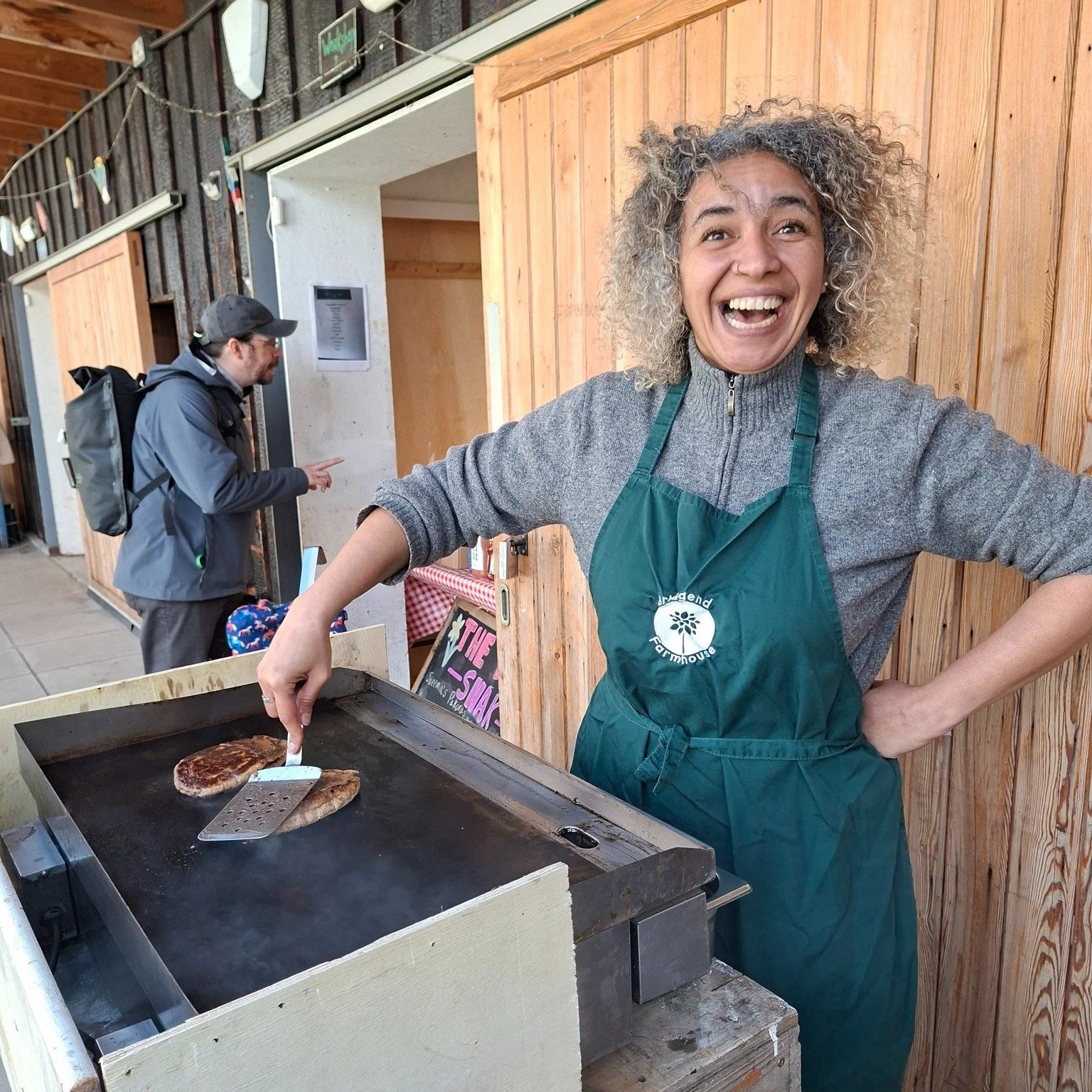 Happy server at the food shack