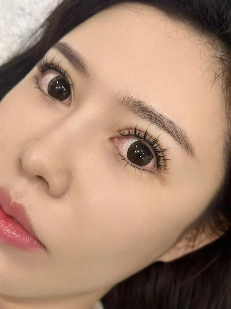 Close-up of a woman's face with focus on eyes and eyelashes