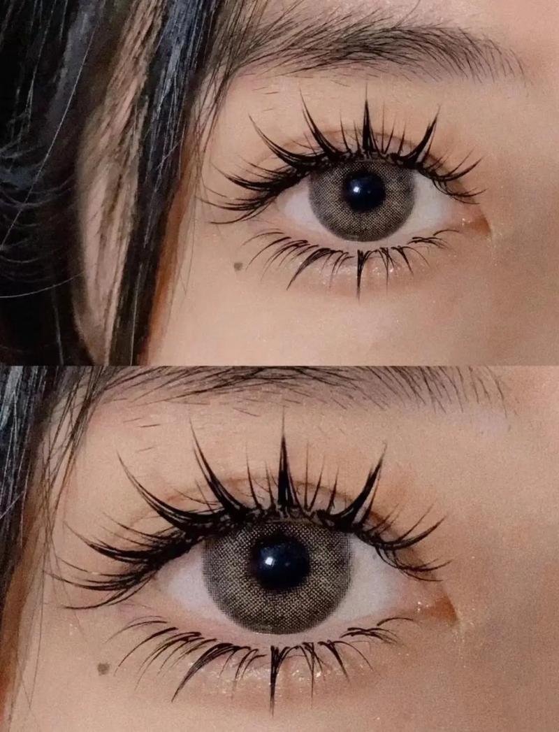 Close-up of two eyes with long eyelashes and grey contact lenses.