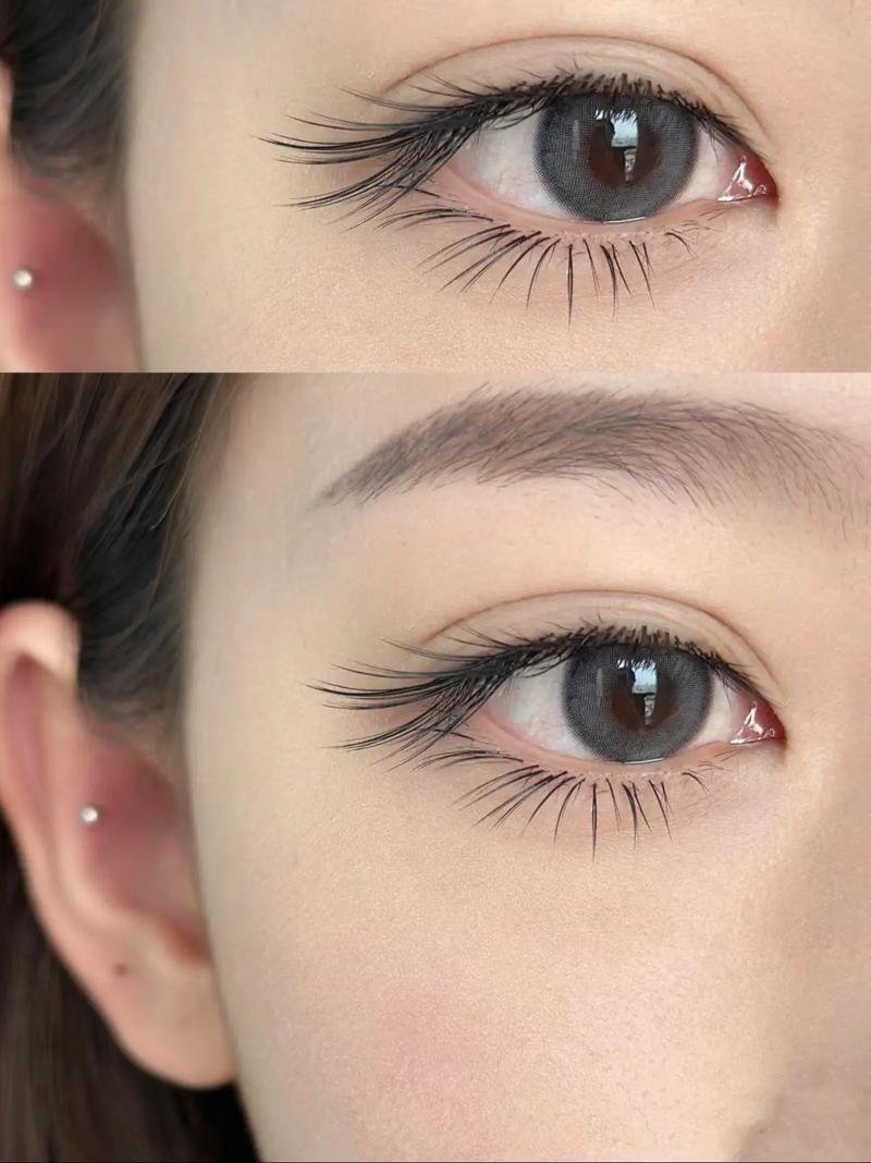 Close-up of eyes with gray contact lenses and long eyelashes, showcasing natural makeup.