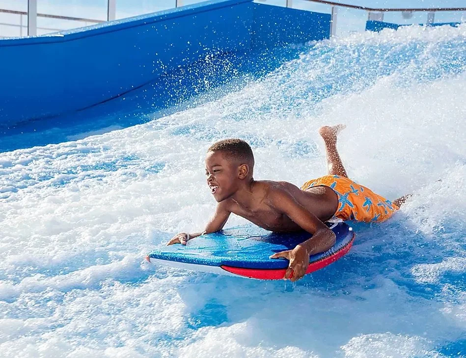 symphony-of-the-seas-flowrider-boy-body-surfing.jpeg