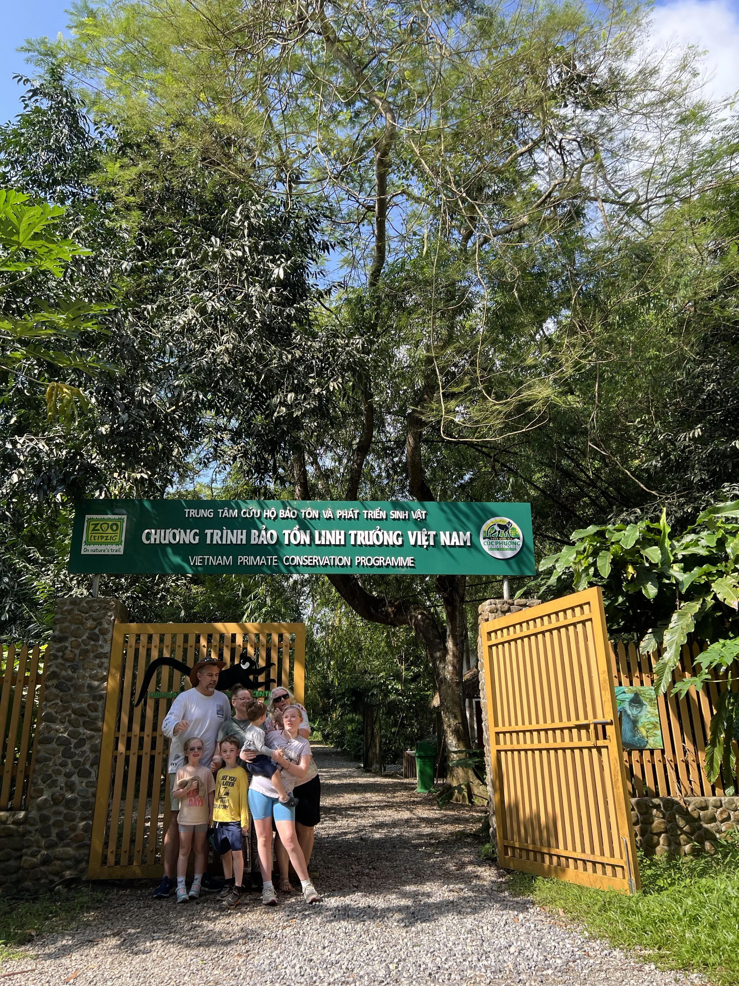 Entrance to the Endangered Primate Rescue Centre under tall trees in Cuc Phuong National Park, Vietnam
