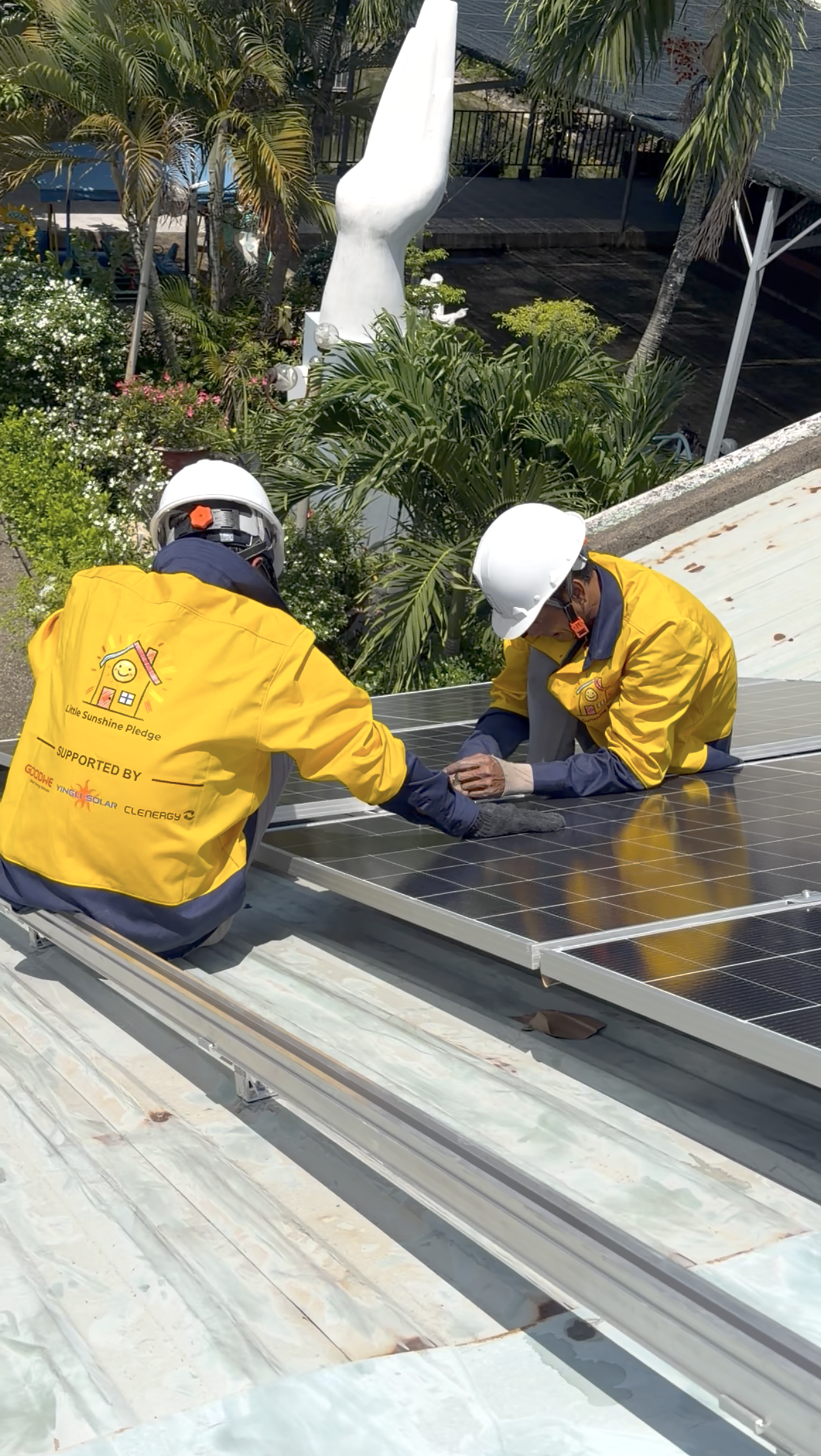 Little Sunshine Pledge installers installing a solar system of a roof of a community centre helping kids with vision disabilities