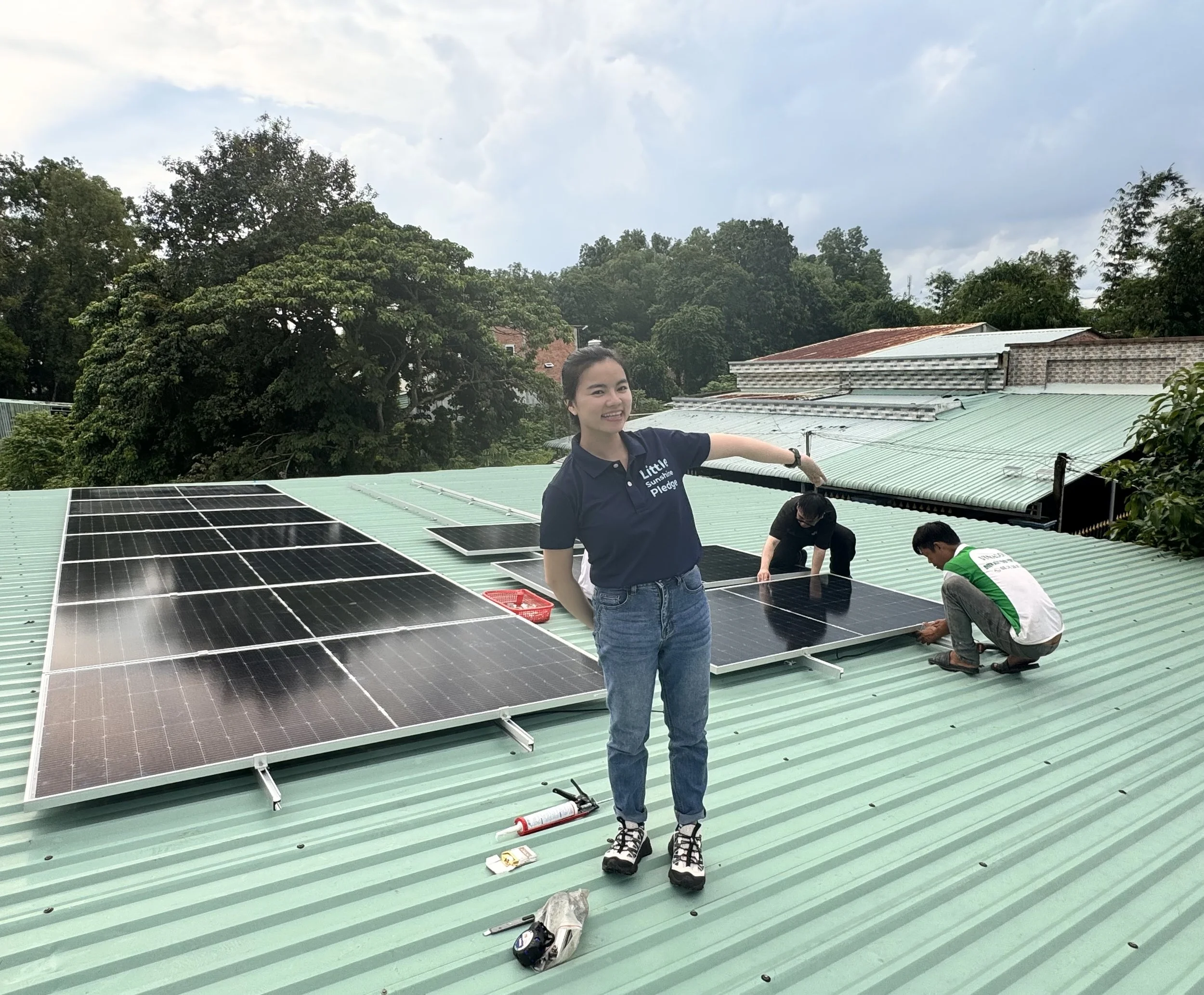 Solar panels being installed on the roof of an orphanage by the Little Sunshine Pledge installation team