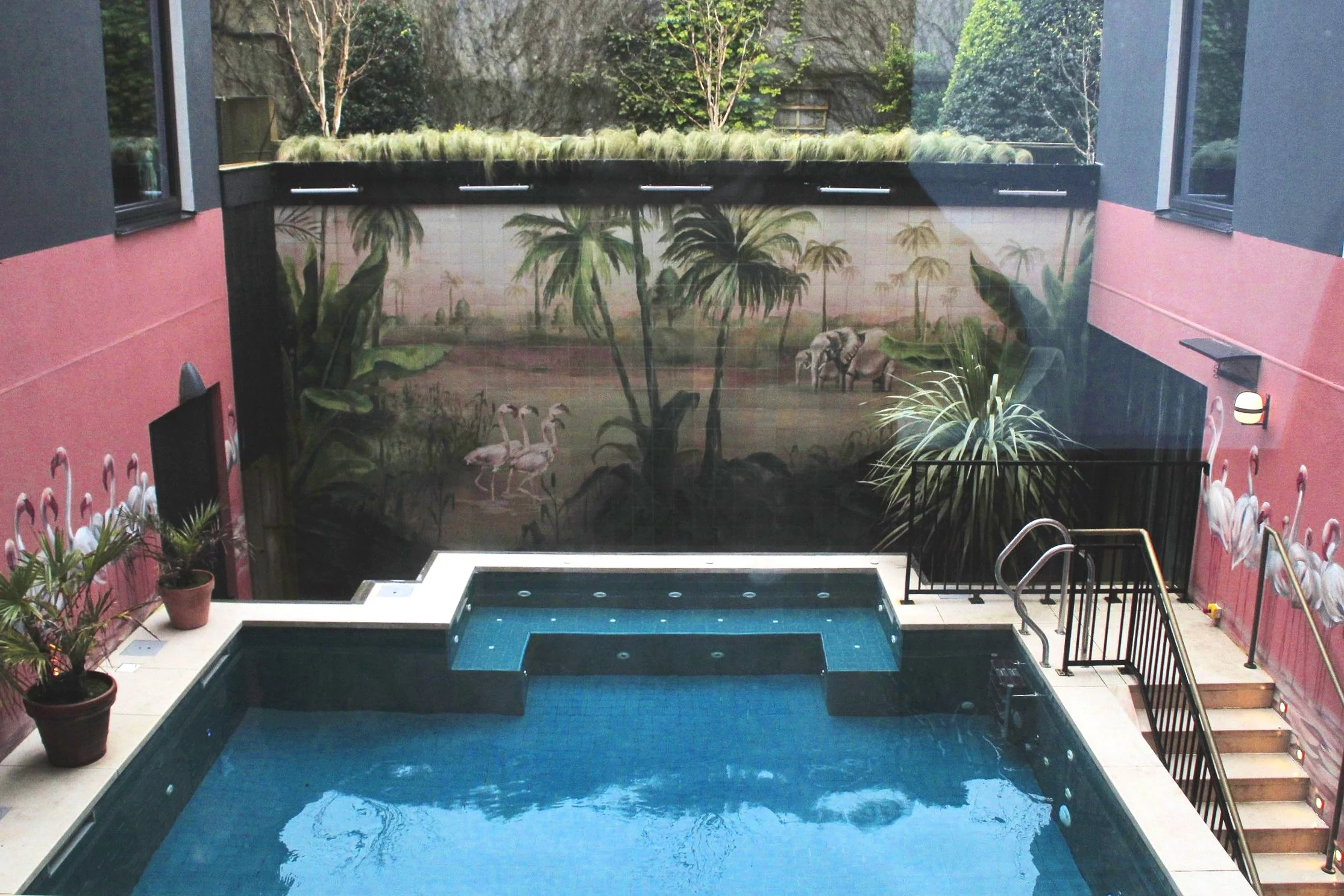 hotel swimming area mural art wall flamingos The Dean Hotel