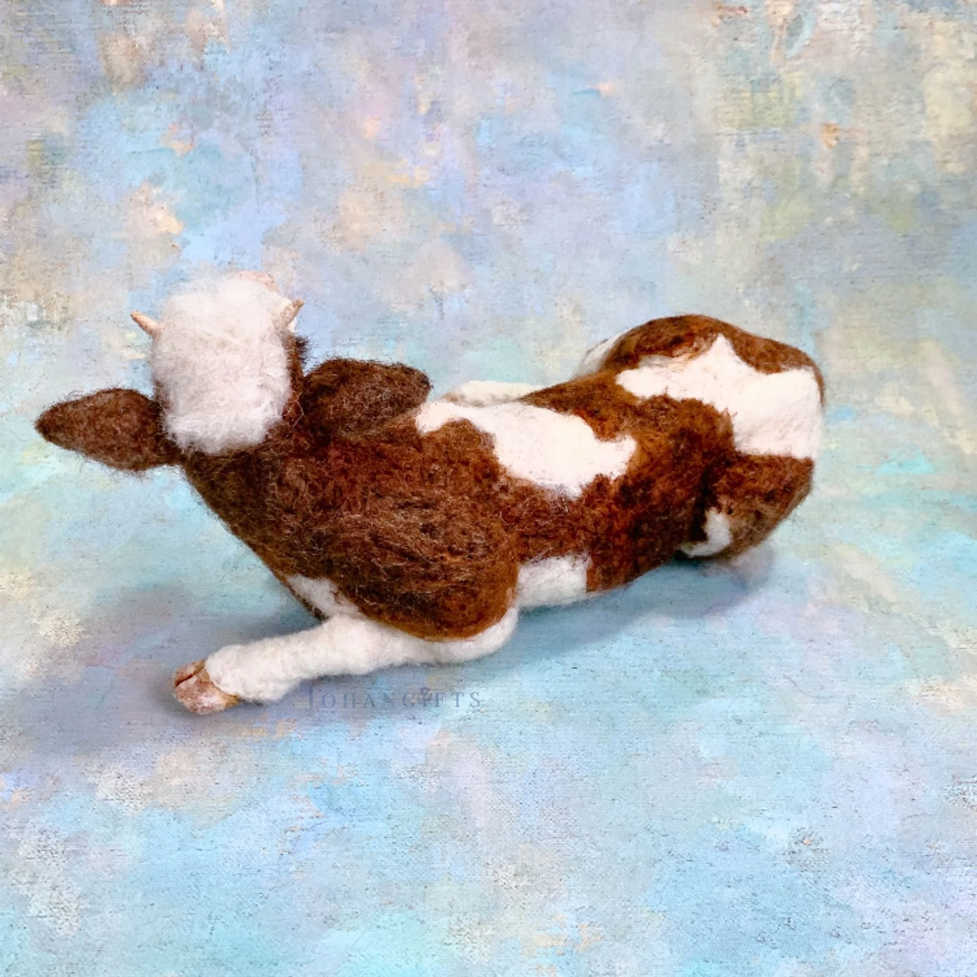 red-white-cow-handmade-wool-sculpture.jpg