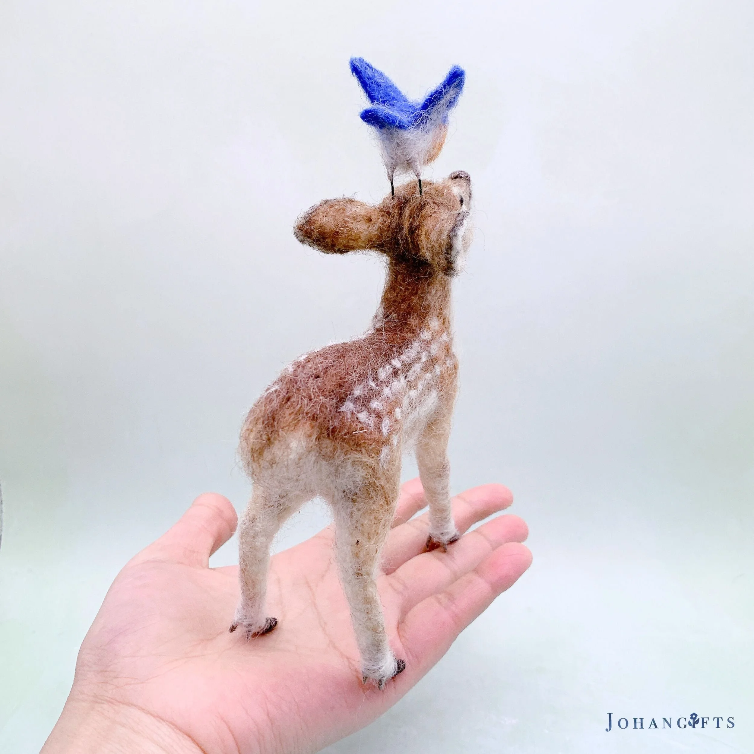 peaceful-fawn-with-bluebird.jpg