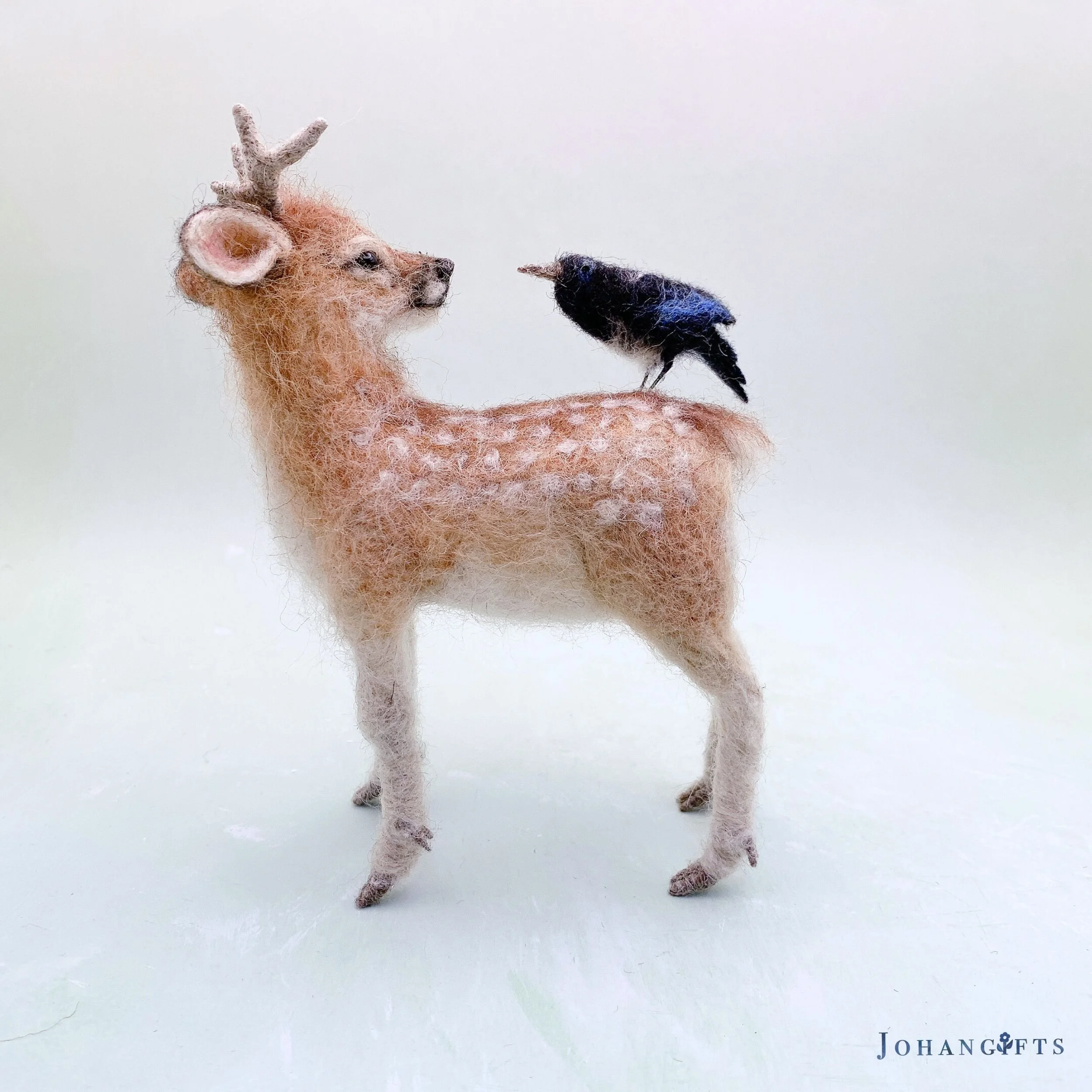 soft-wool-fawn-with-magpie-companion.jpg