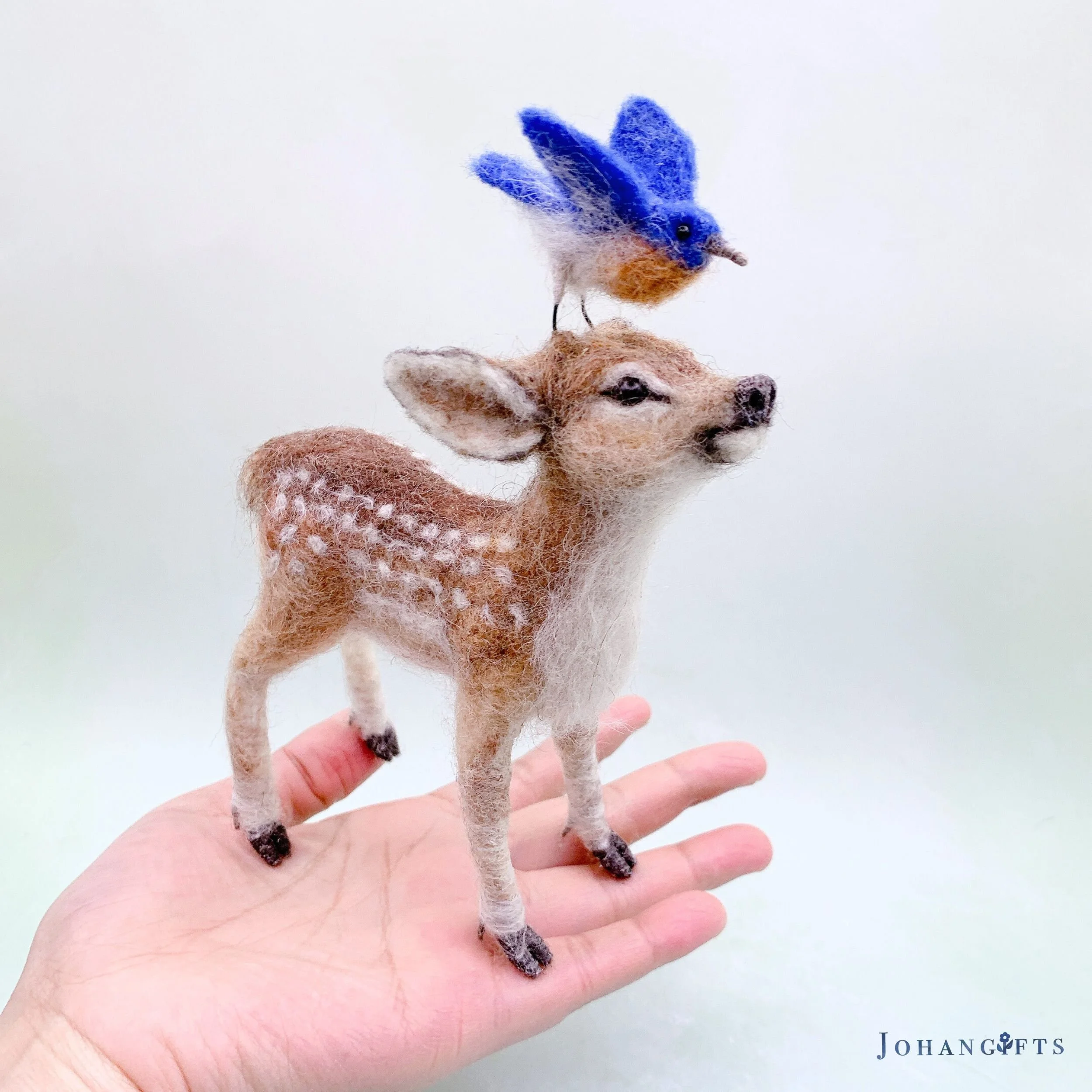 deer-fawn-bluebird-sculpture.jpg