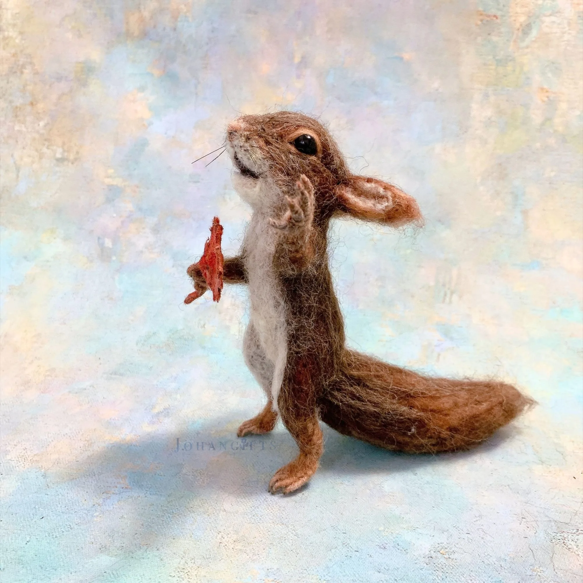needle-felted-squirrel-holding-maple-leaf-autumn.jpg