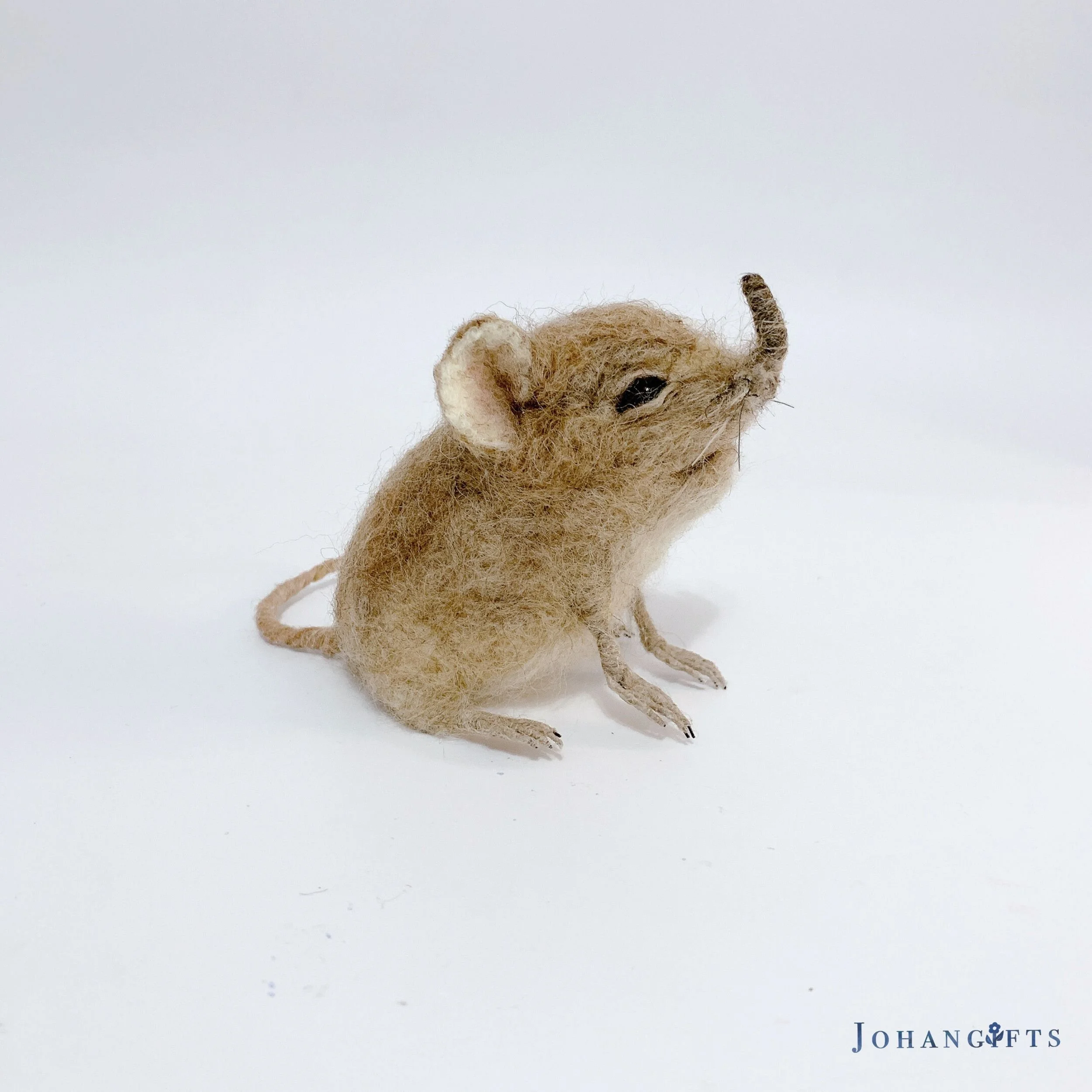 tiny-elephant-shrew-wool-statue.jpg