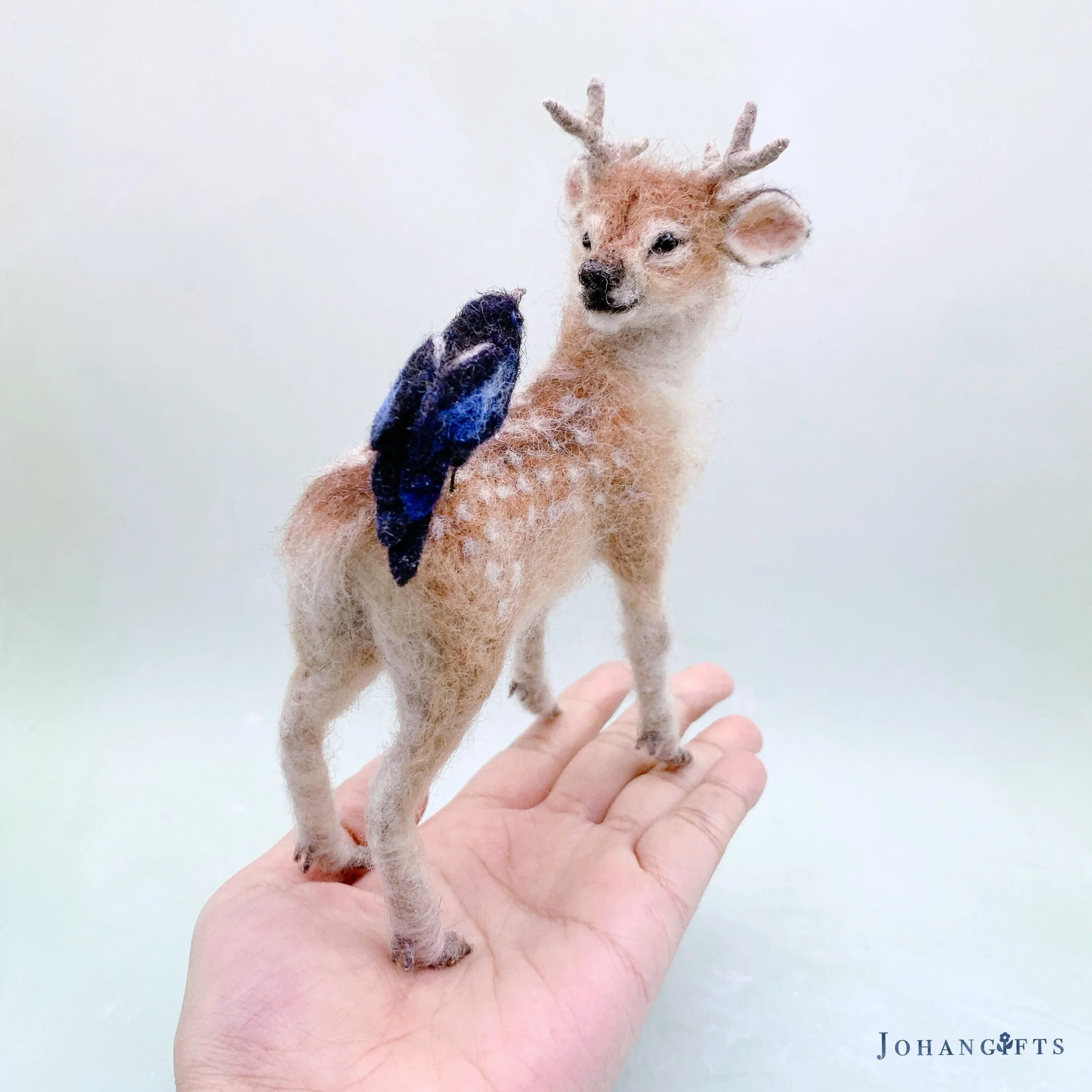 handmade-wool-deer-and-magpie-figurine.jpg