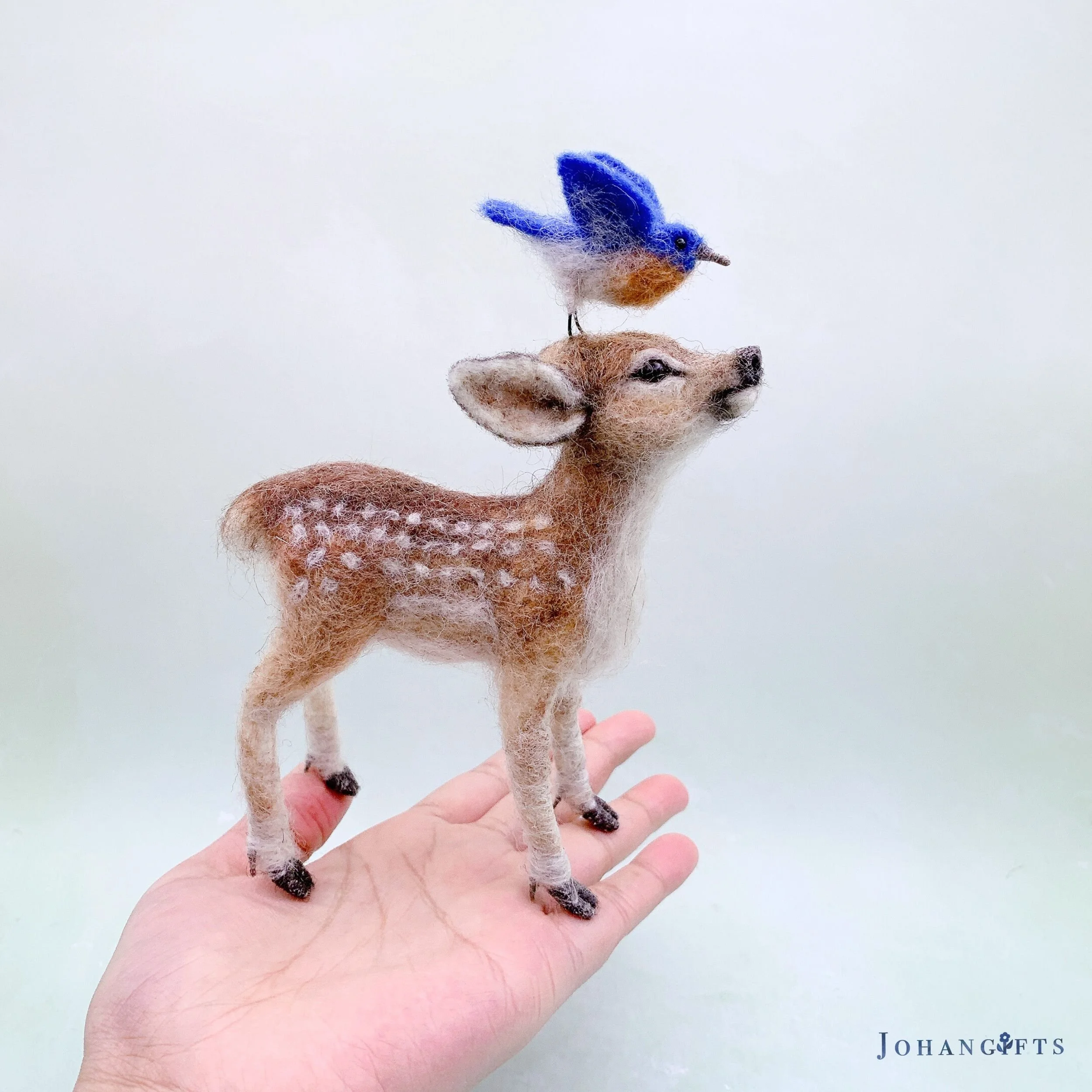 calm-forest-fawn-bluebird.jpg