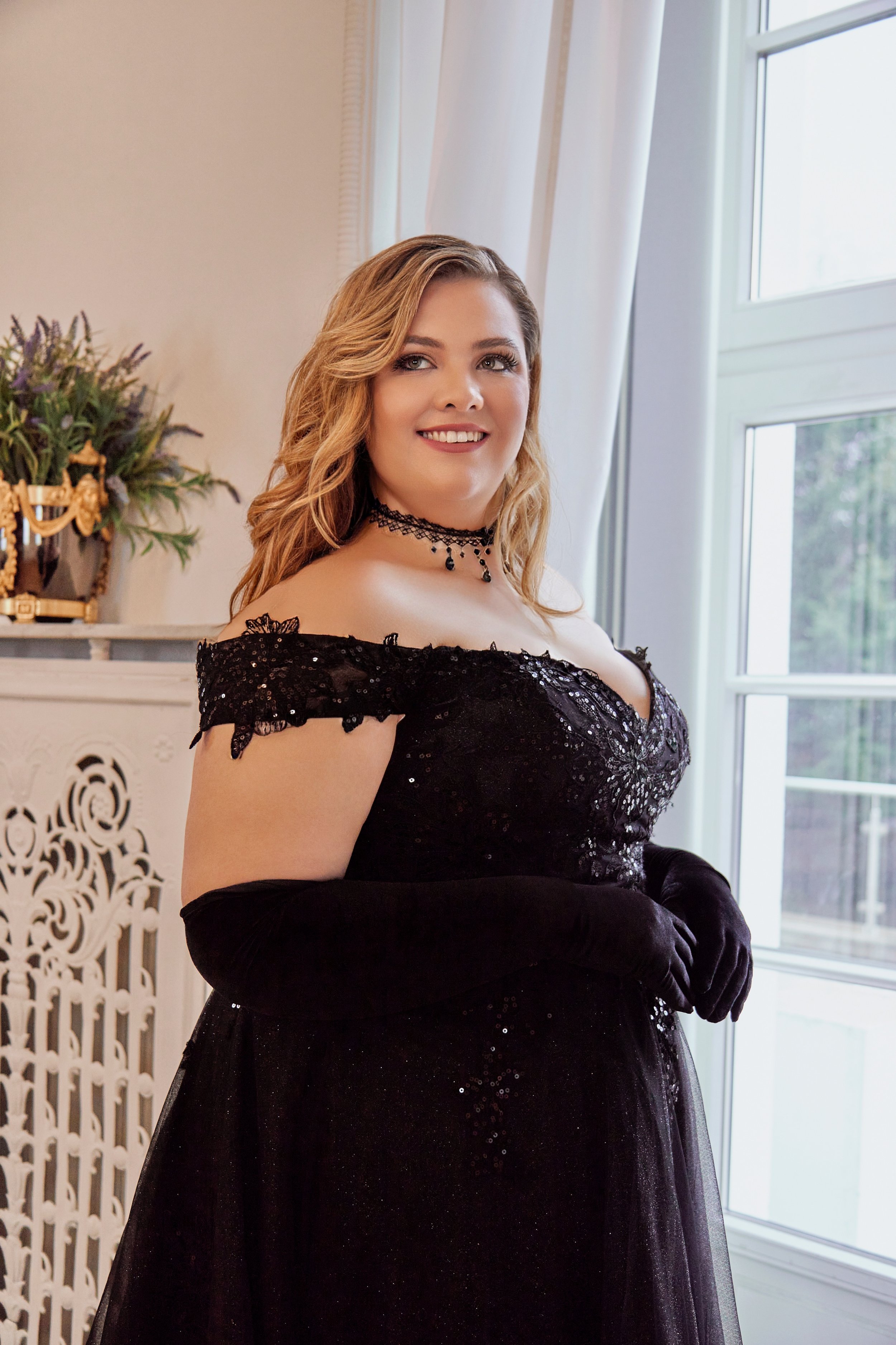 Close-up of Lia Bella Model Tiana highlighting the black sequinned lace bodice, sweetheart neckline and off-the-shoulder straps.