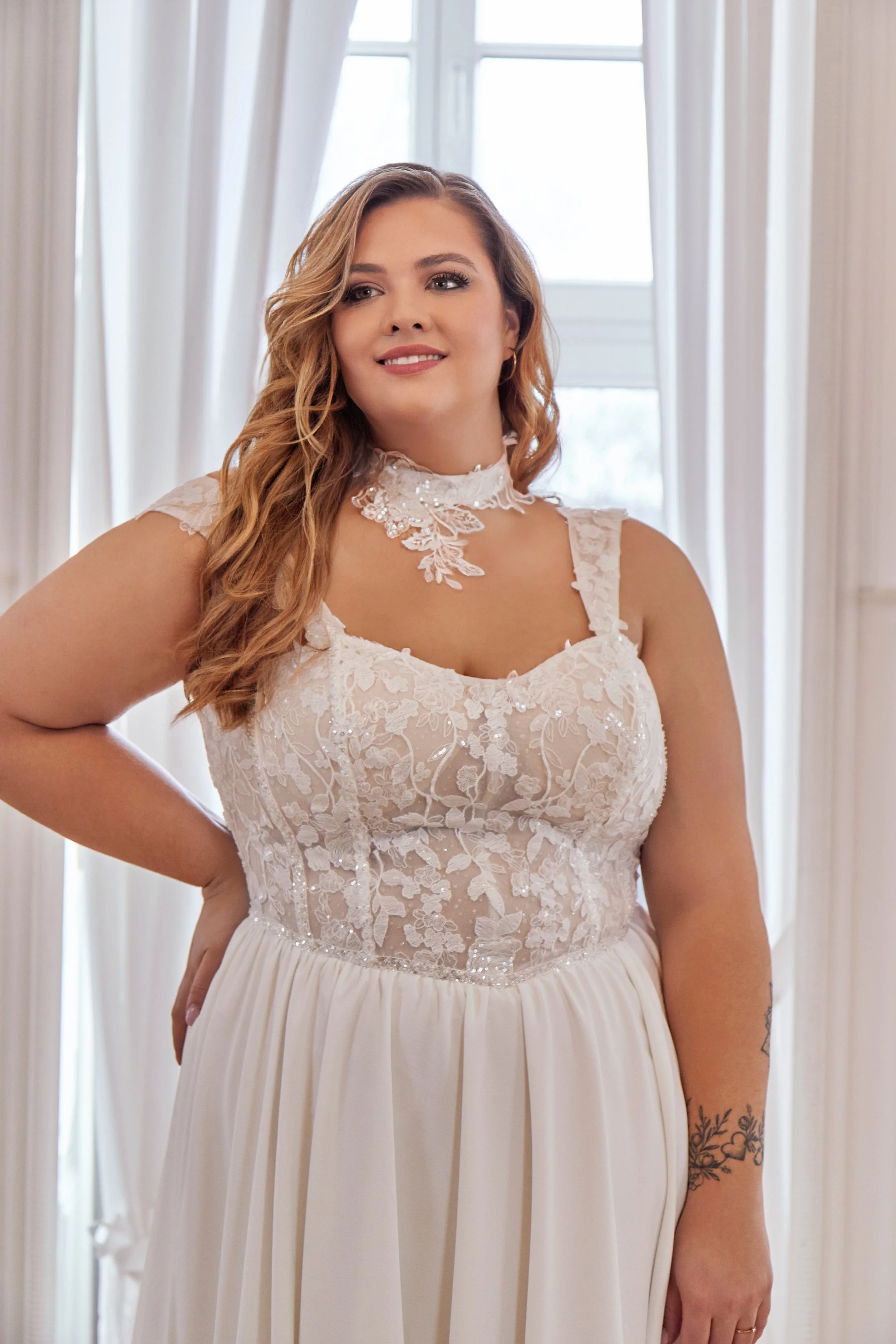 Close-up of Lia Bella Model Tibby Curvy highlighting the floral lace illusion bodice, wide straps and delicate beaded details.