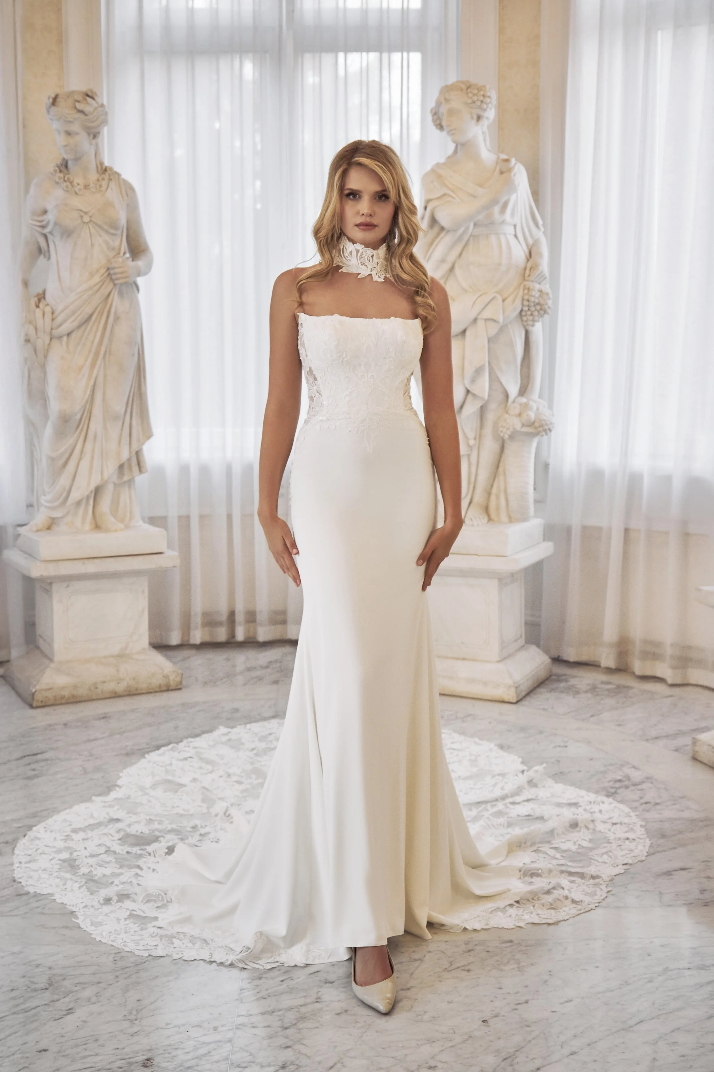 Front view of Lia Bella Model Tabea, a fit-and-flare wedding dress with a strapless lace bodice and smooth skirt.