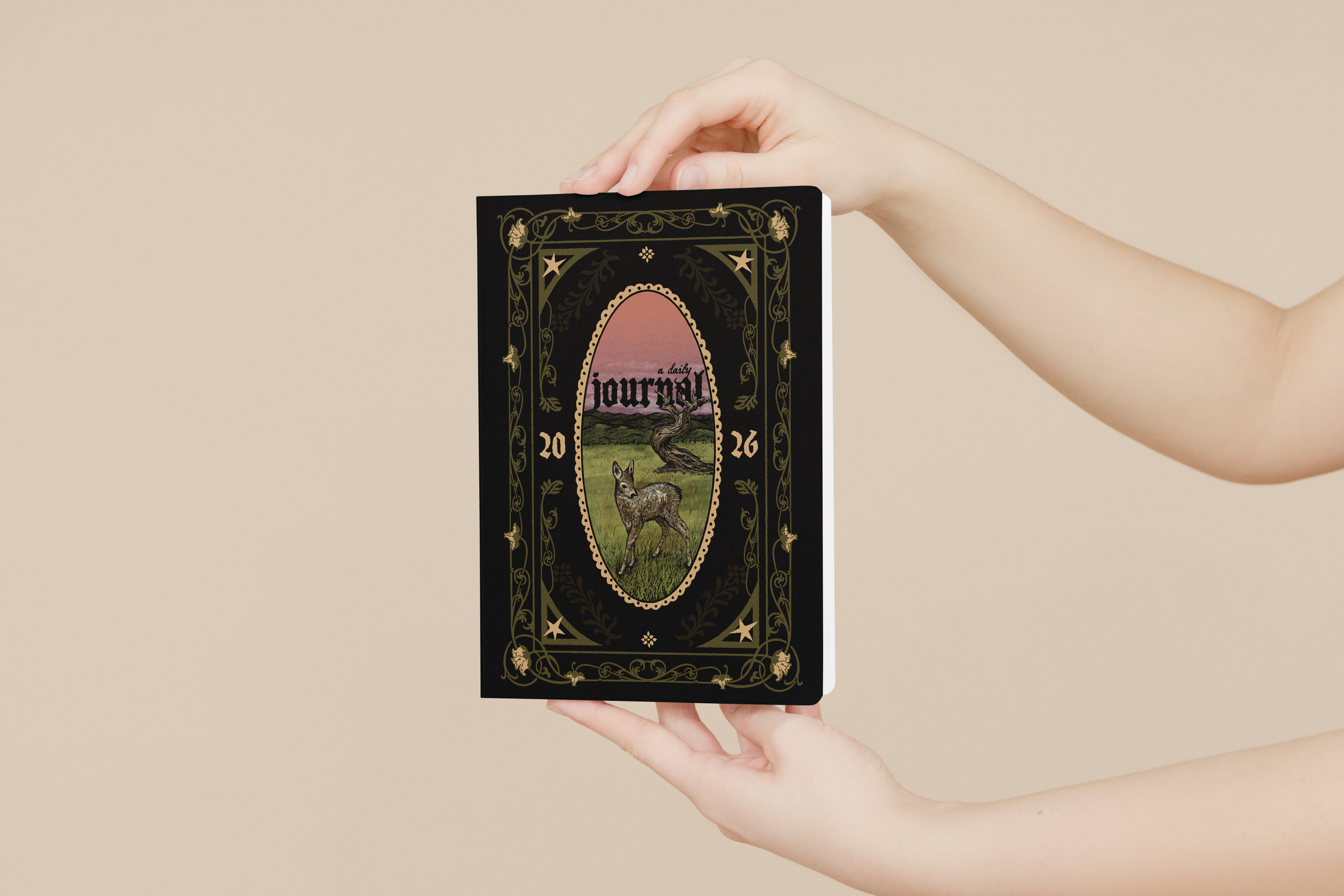 Book in Hands Mockup.png
