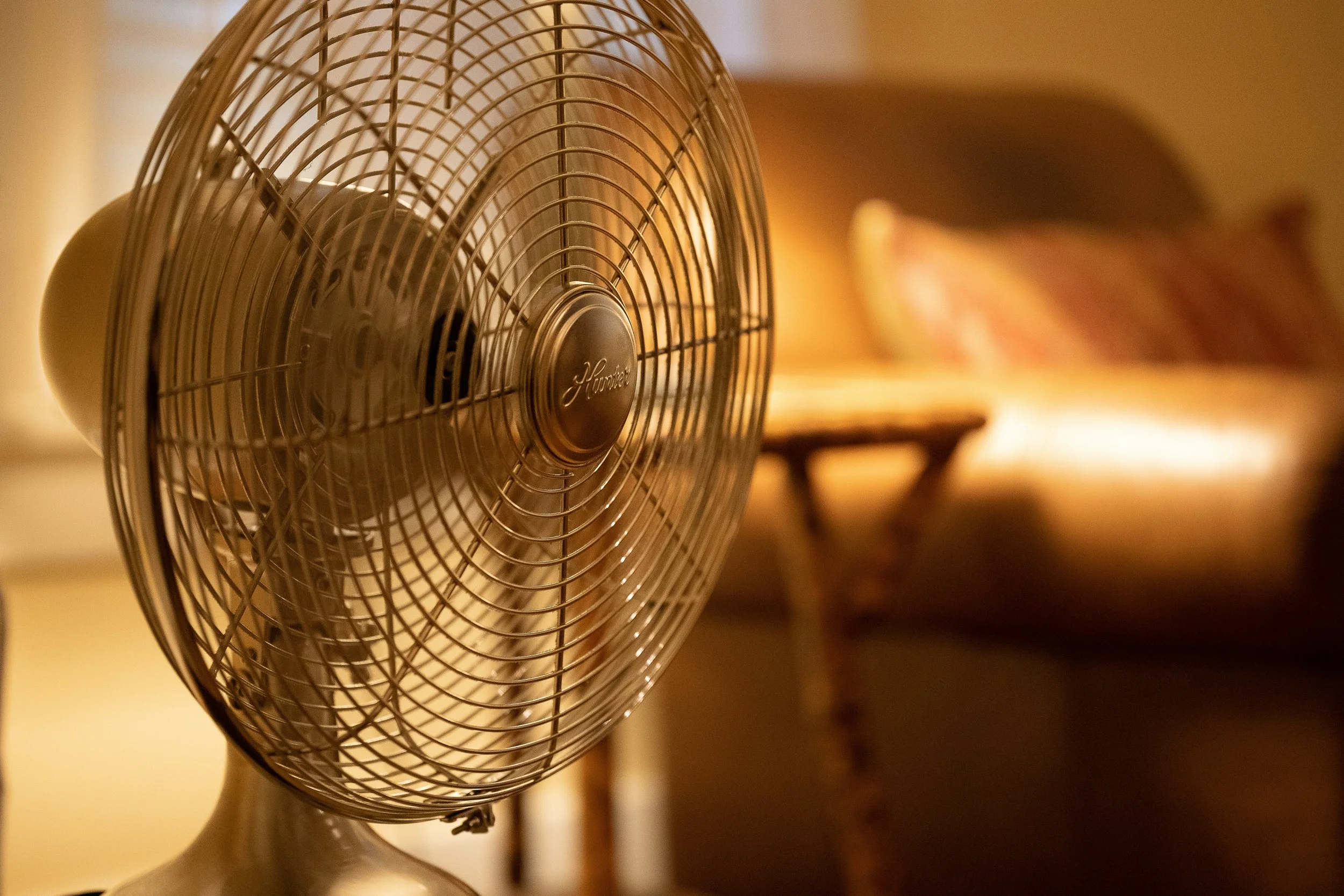 Vintage brass fan in warm evening light