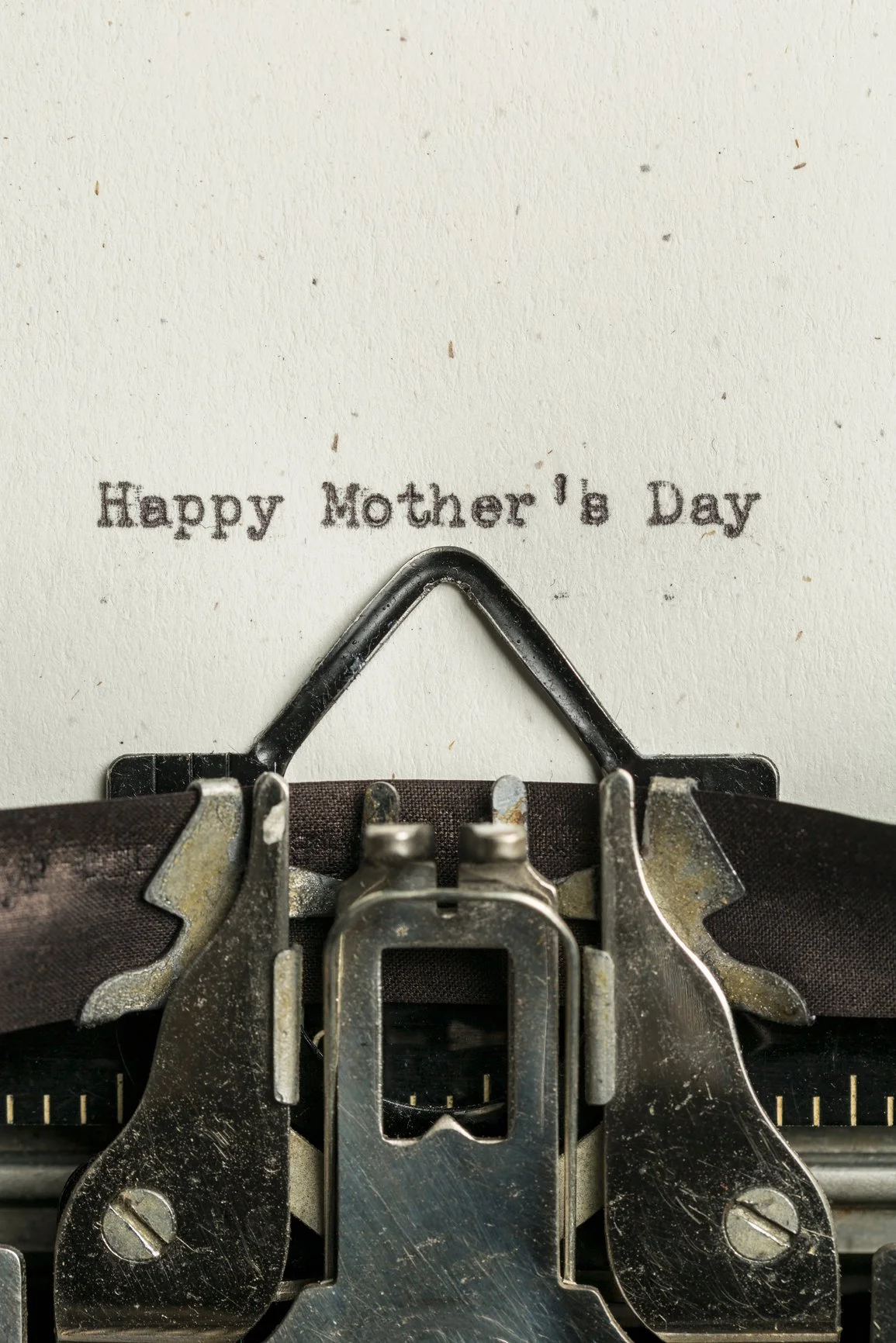Vintage typewriter with Happy Mother's Day typed on white paper