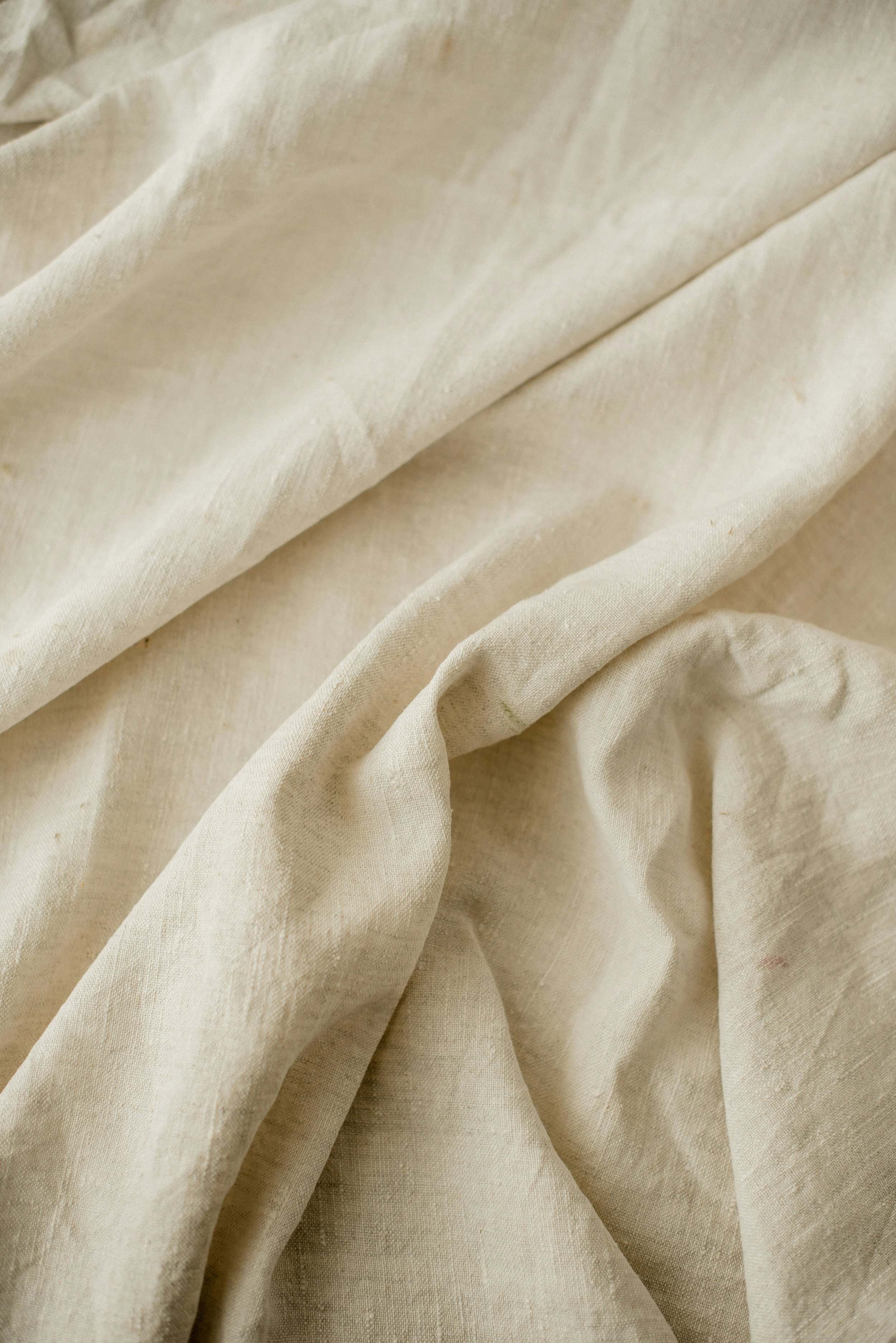 Soft folds of natural linen fabric
