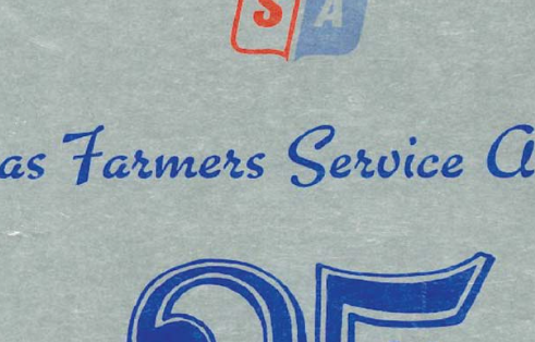 Close-up of a sign with partial text reading 'Farmers Service A' and the number '25' visible, featuring a logo with the letters 'S' and 'A' in red and blue.