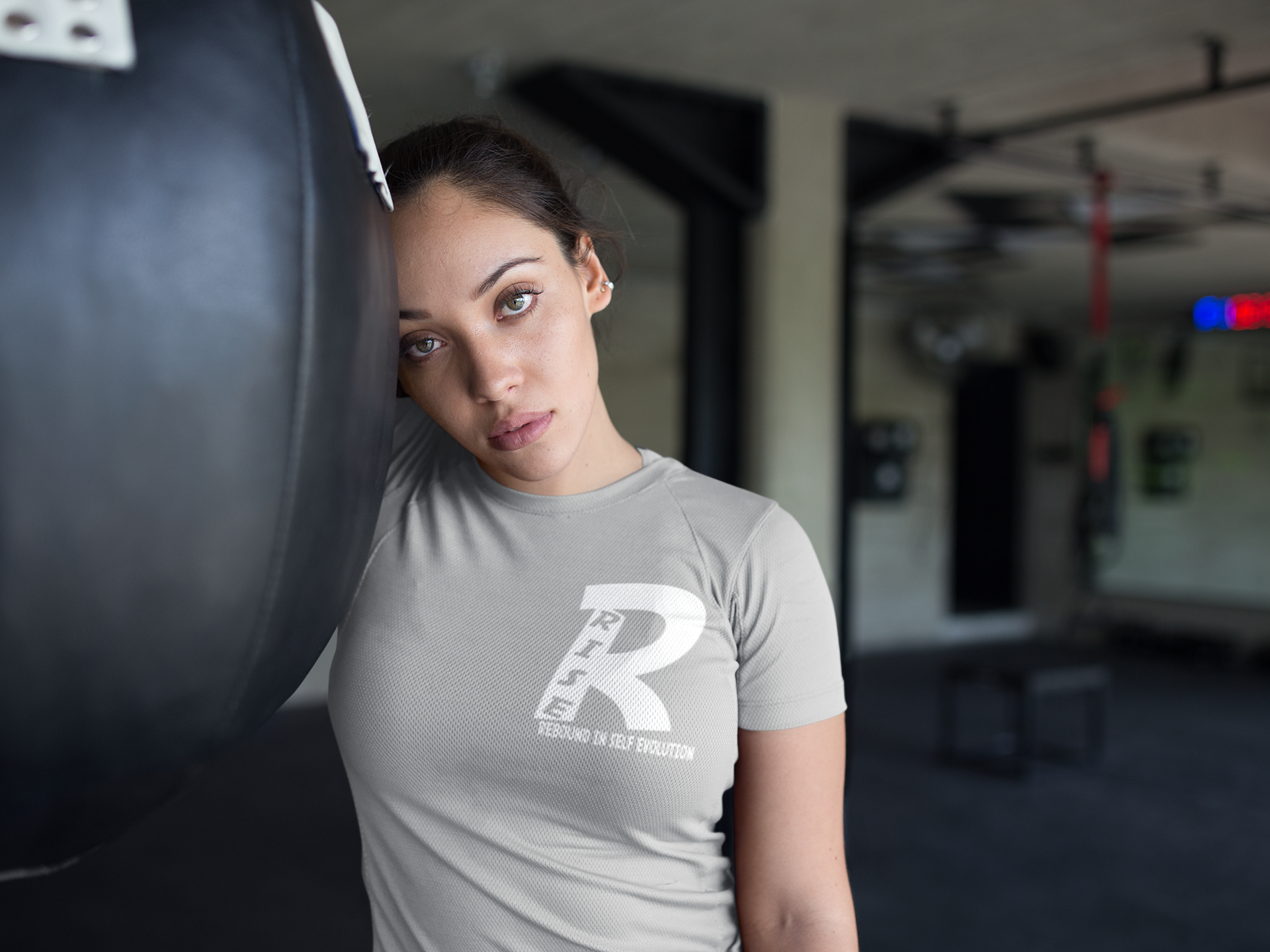 beautiful-girl-resting-at-the-gym-while-wearing-custom-sportswear-mockup-a16834 (4).png