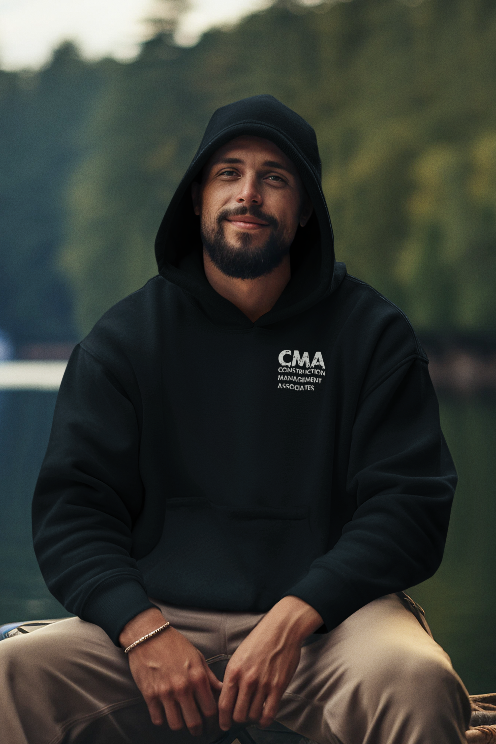pullover-hoodie-mockup-of-an-ai-created-bearded-man-posing-with-a-smiley-look-outdoors-m37497 (1).png