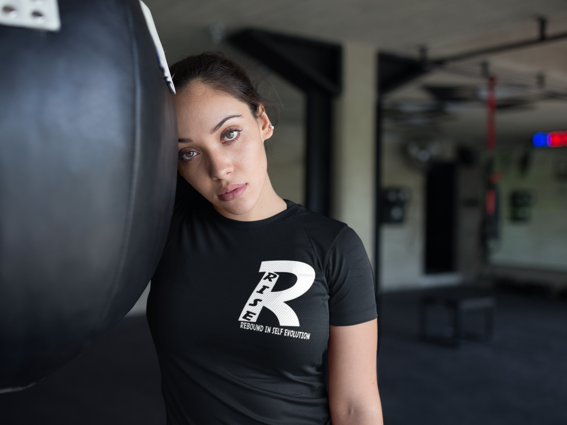 beautiful-girl-resting-at-the-gym-while-wearing-custom-sportswear-mockup-a16834 (2).png