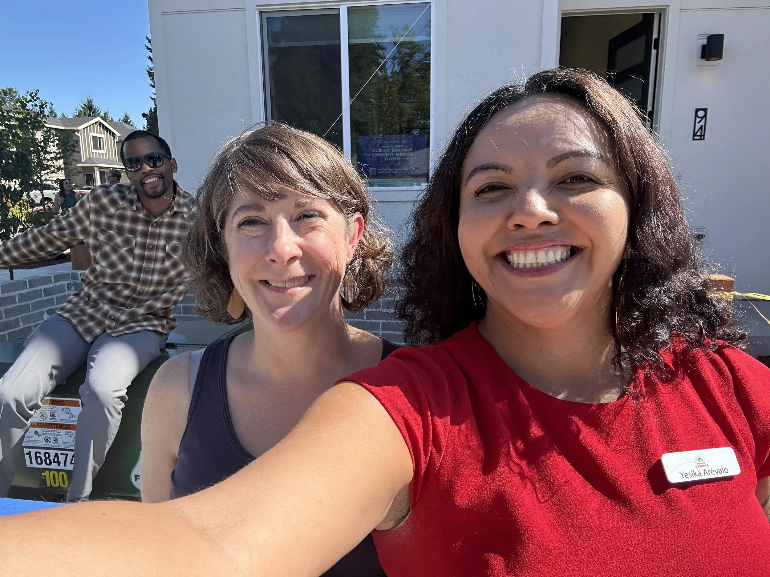 Proud Ground Realtor Undra Adams, Associate Director Katie Ullrich, and Senior Homeownership Counselor Yesika Arévalo