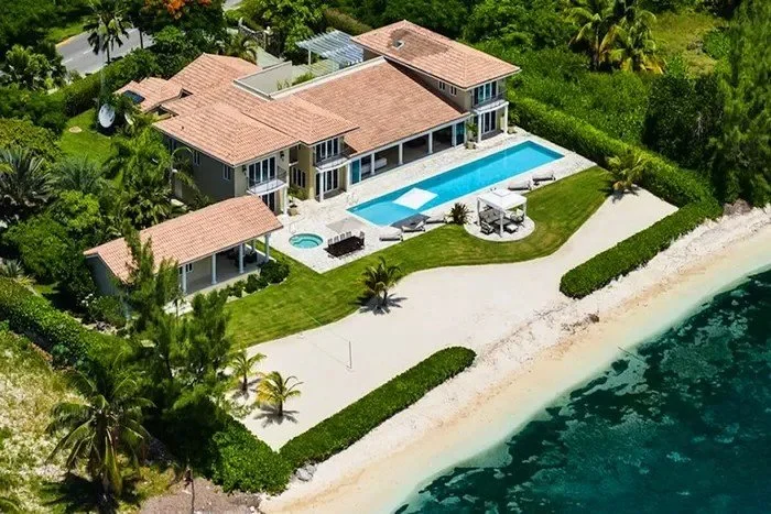 Aerial drone view of tiled roofs on a Grand Cayman home