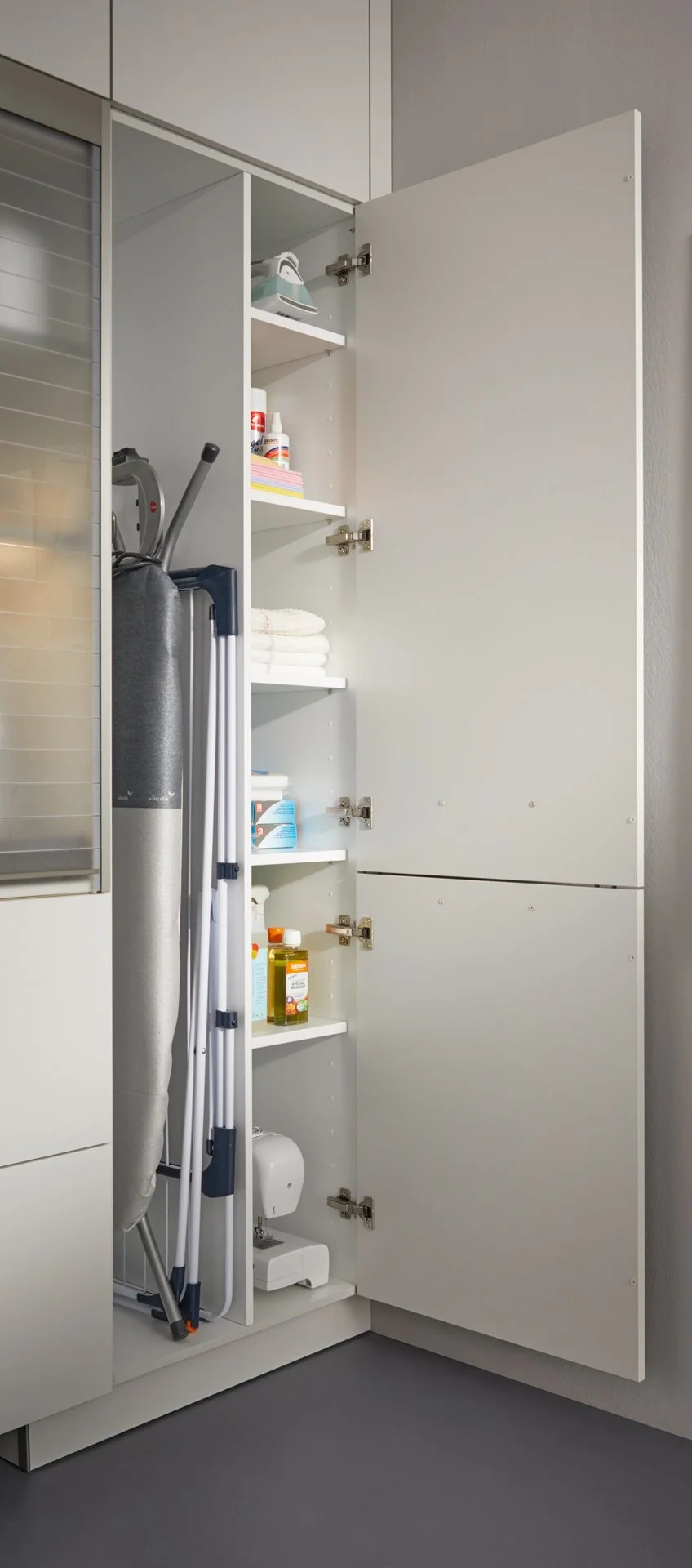 ironing board storage.jpg