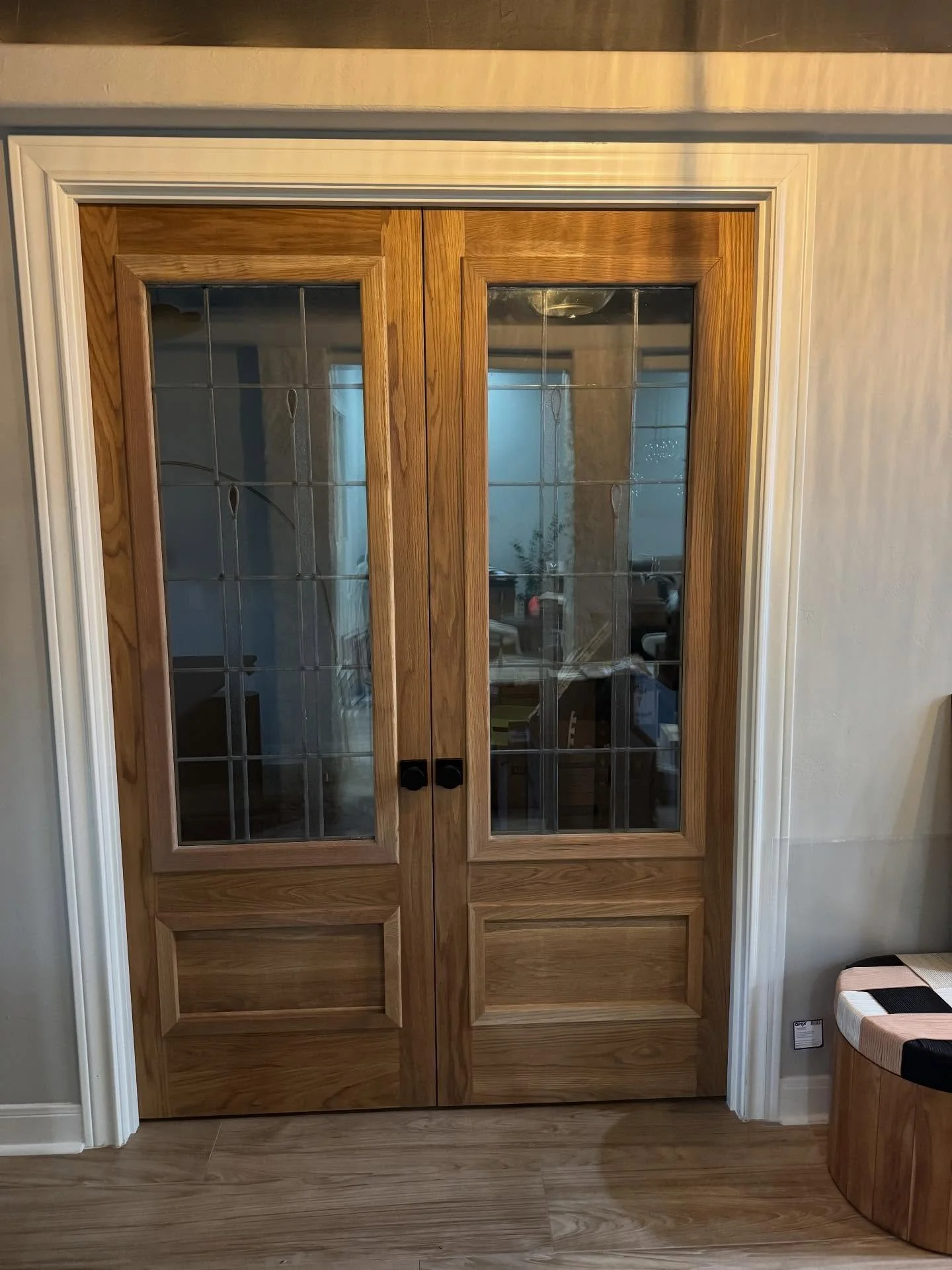 Repurposing these fragile stained glass windows into office doors was one of our favorite projects this year.