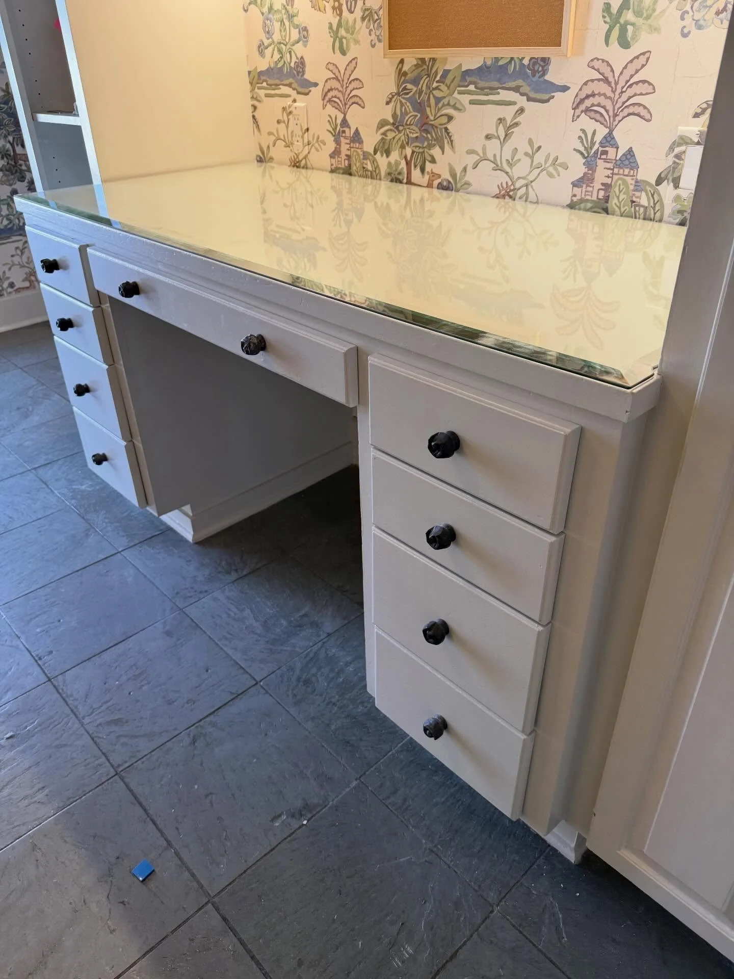 Our clients issue with the marks on their newly painted built in is resolved with this beautiful beveled desk top.