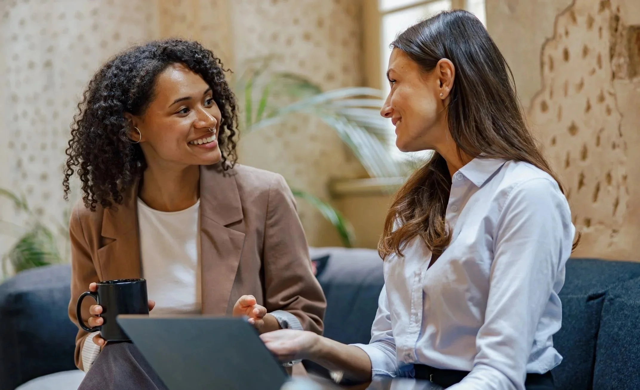A sales leader coaching a team member one on one