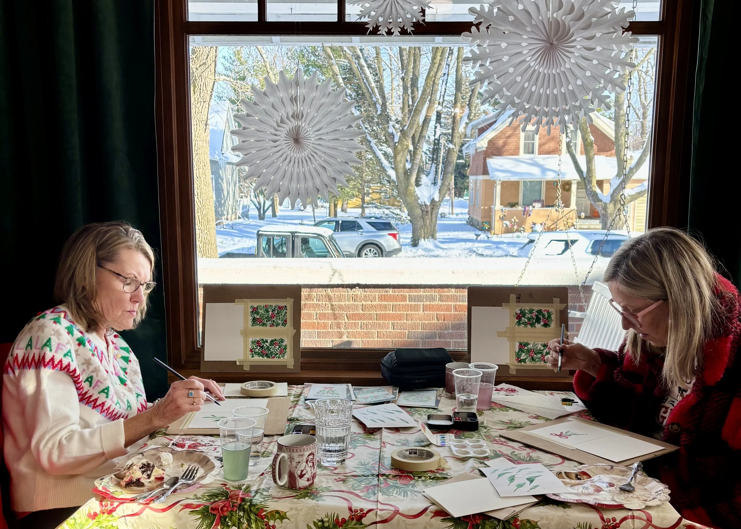 Painting watercolor holiday cards at the tea room.  2025