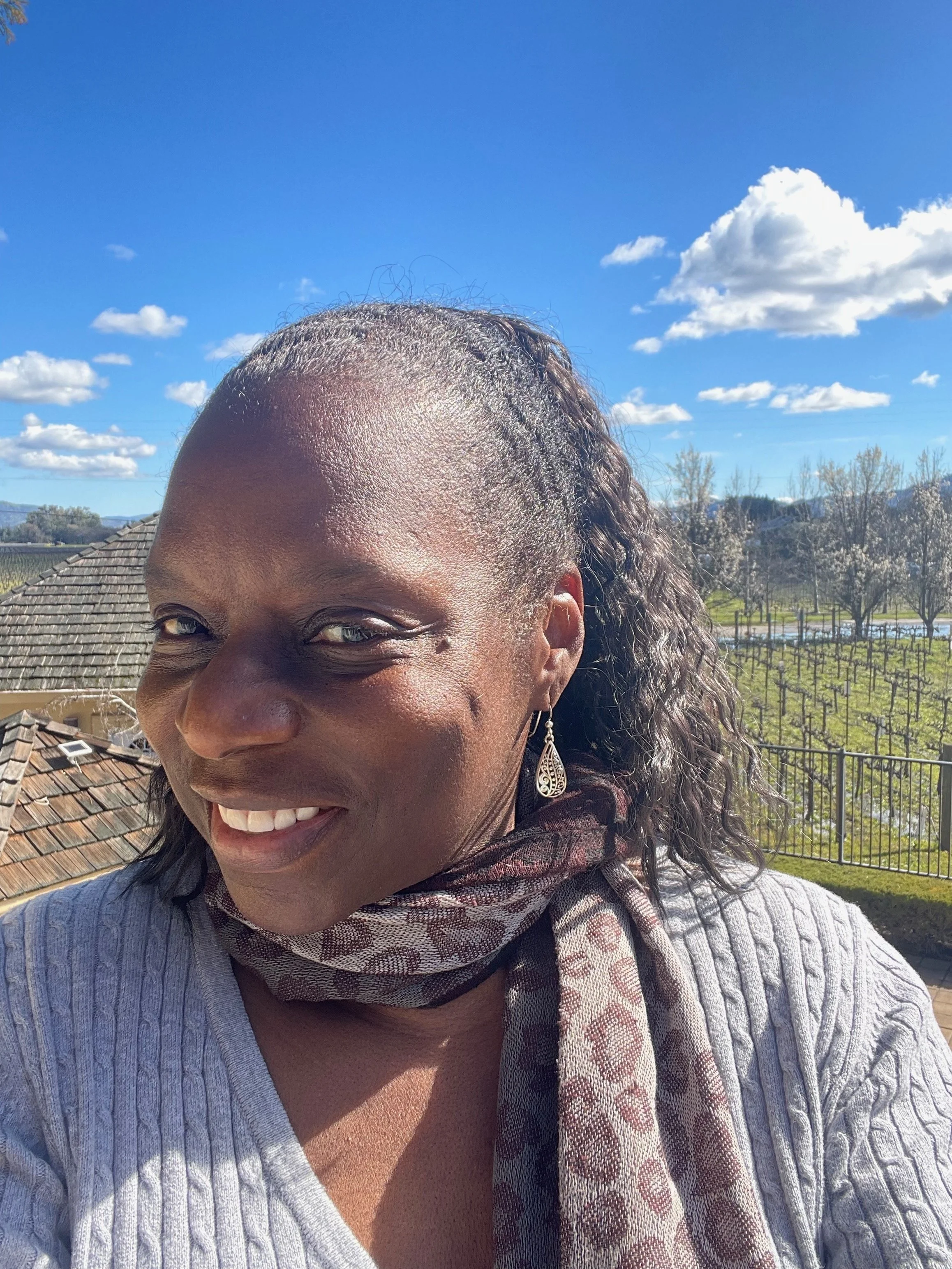 Kelly E. Carter selfie, woman in Napa Valley vineyard