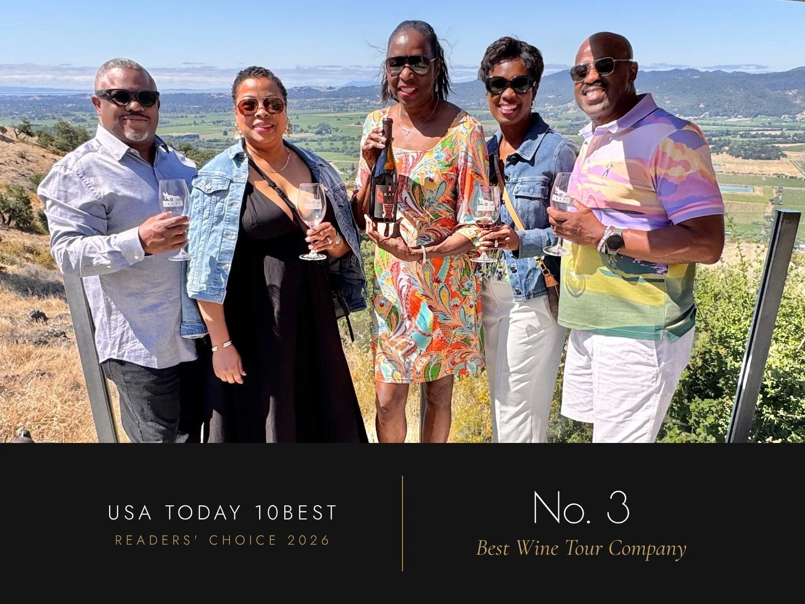 Kelly E. Carter holding a bottle of Okapi wine with four clients from Texas at a private tasting overlooking Napa Valley, above the text “USA TODAY 10BEST Readers’ Choice 2026, No. 3 Best Wine Tour Company.”